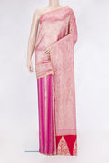Rani Pink Tussar Silk Saree with Stripes on the body and Zari Border.  displayed on a mannequin