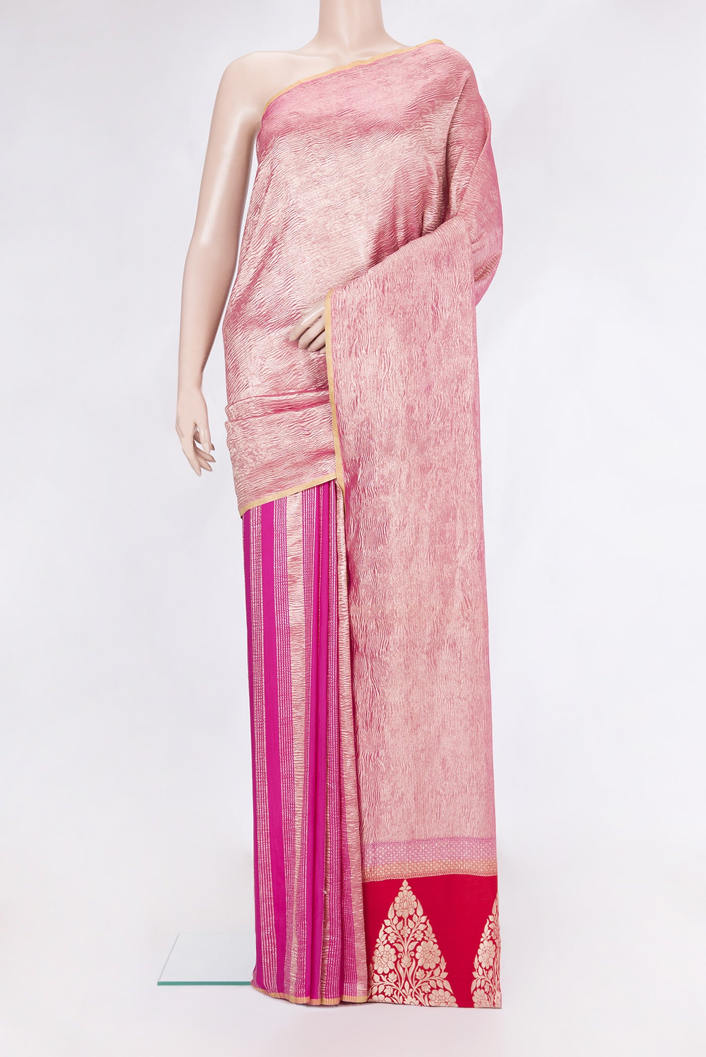 Rani Pink Tussar Silk Saree with Stripes on the body and Zari Border.  displayed on a mannequin