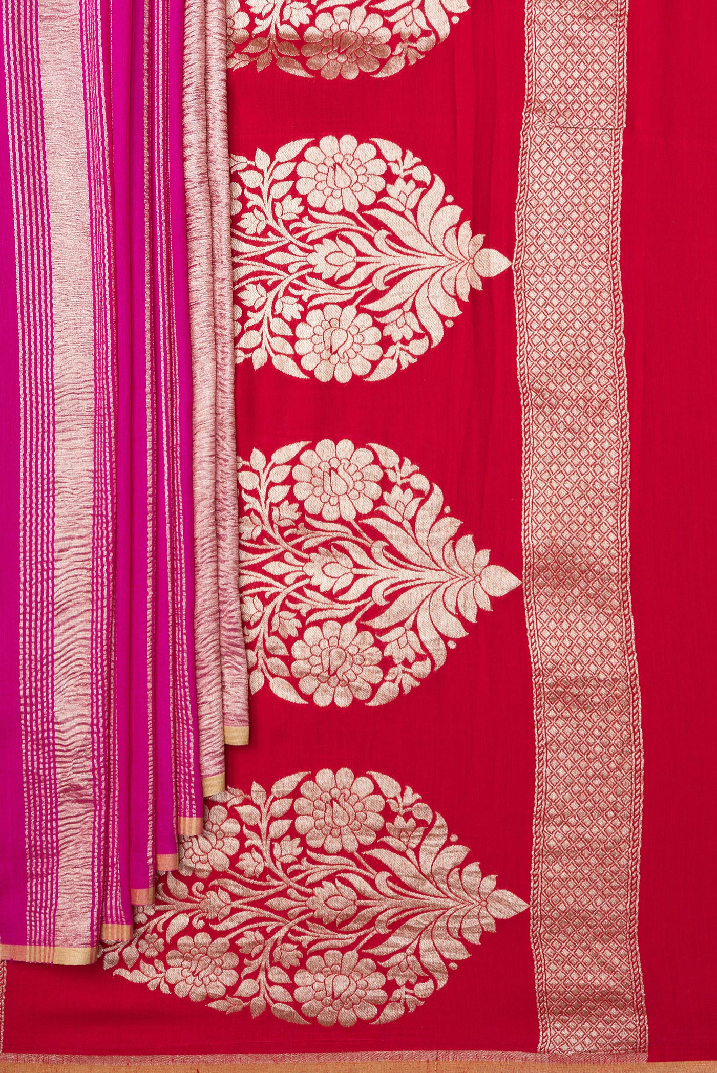 Pleats and pallu of Rani Pink Tussar Silk Saree with Stripes on the body and Zari Border. 