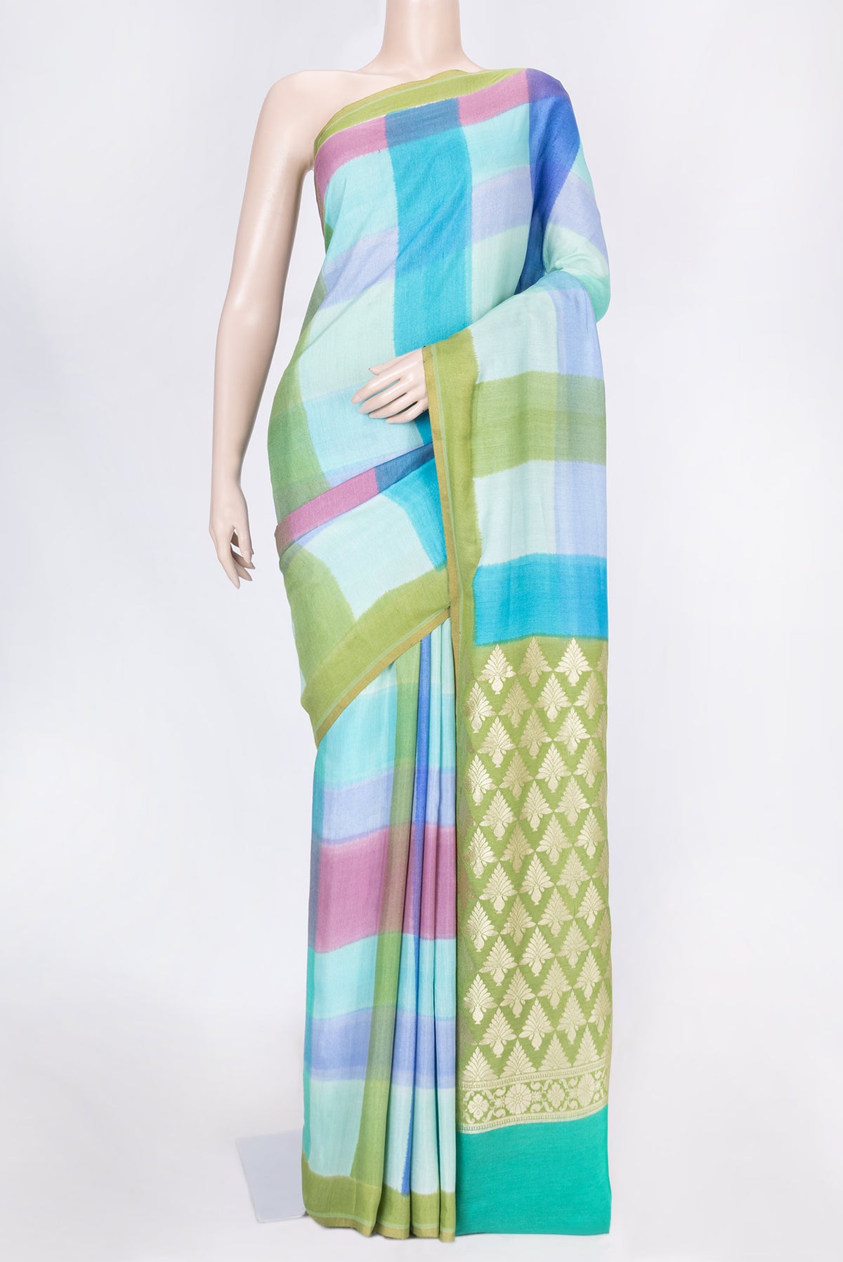Sky Blue, Pink and Green Color Tussar Silk Saree with Printed design on the body and Zari Border displayed on a mannequin