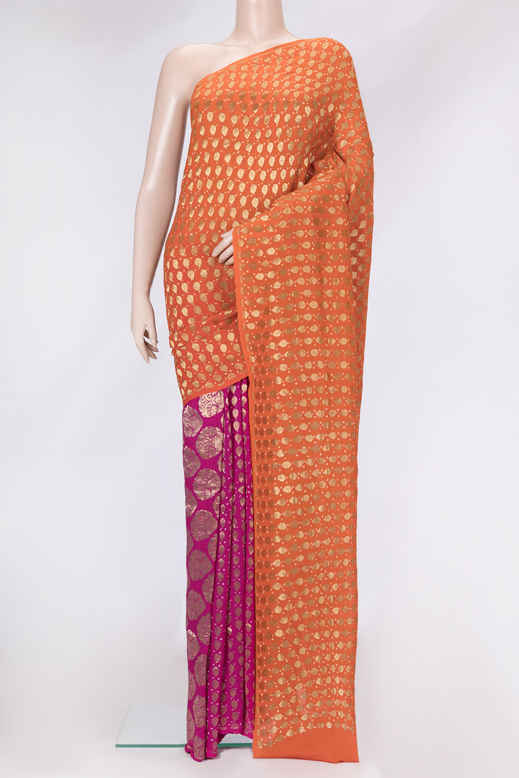 Orange Dual Tone Mysore Georgette Saree with Zari Brocade on the body and Without Border.  displayed on a mannequin