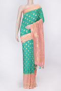 Green Dual Tone Banarasi Silk Saree with Zari Brocade on the body and Zari Border displayed on a mannequin