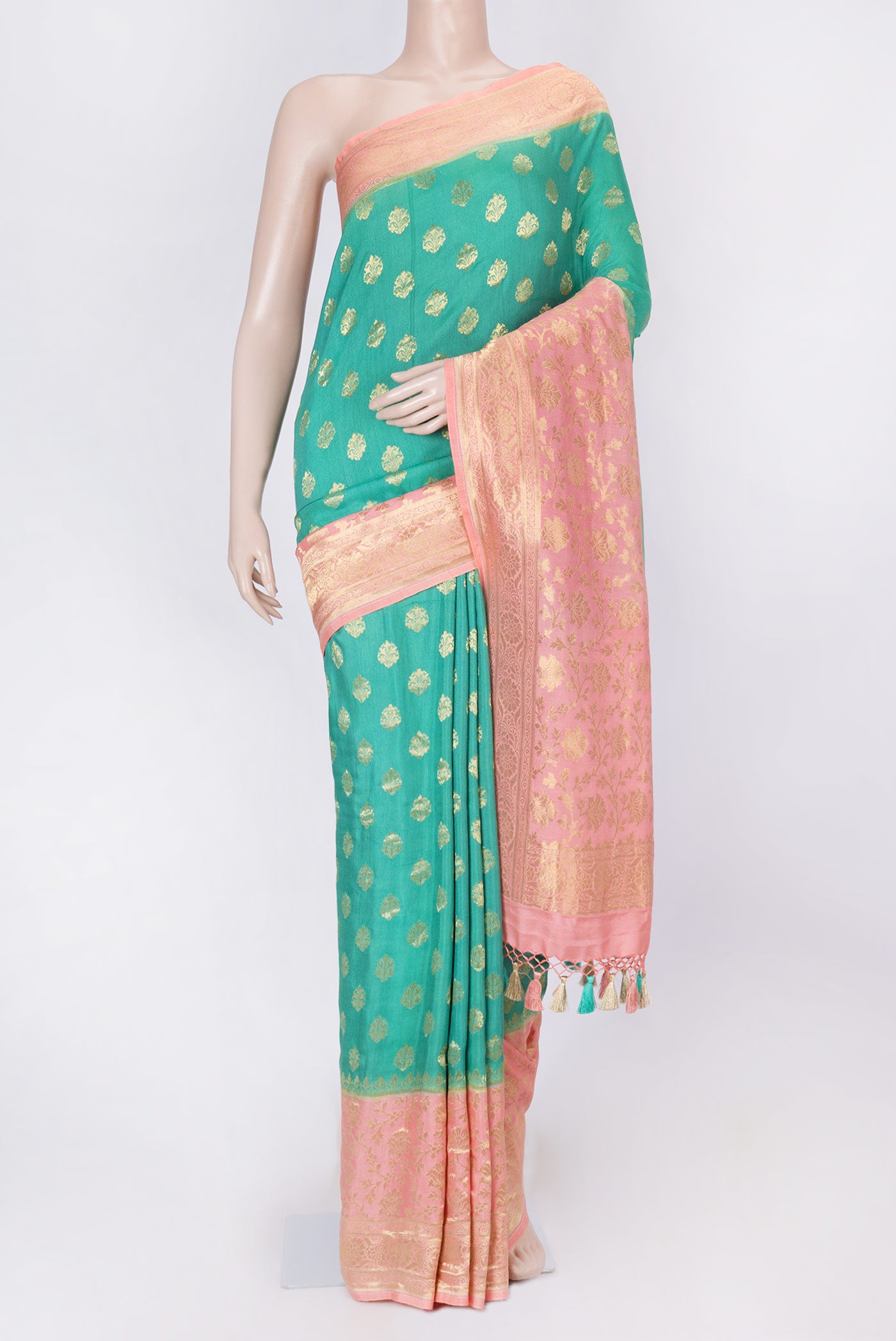 Green Dual Tone Banarasi Silk Saree with Zari Brocade on the body and Zari Border displayed on a mannequin