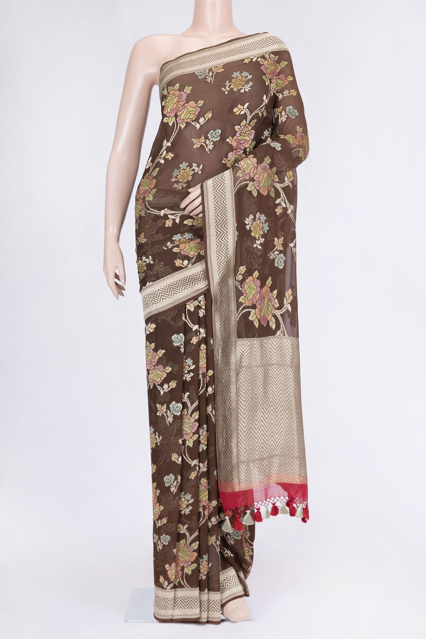 Brown Dual Tone Banarasi Saree with Zari Brocade on the body and Zari Border.  displayed on a mannequin