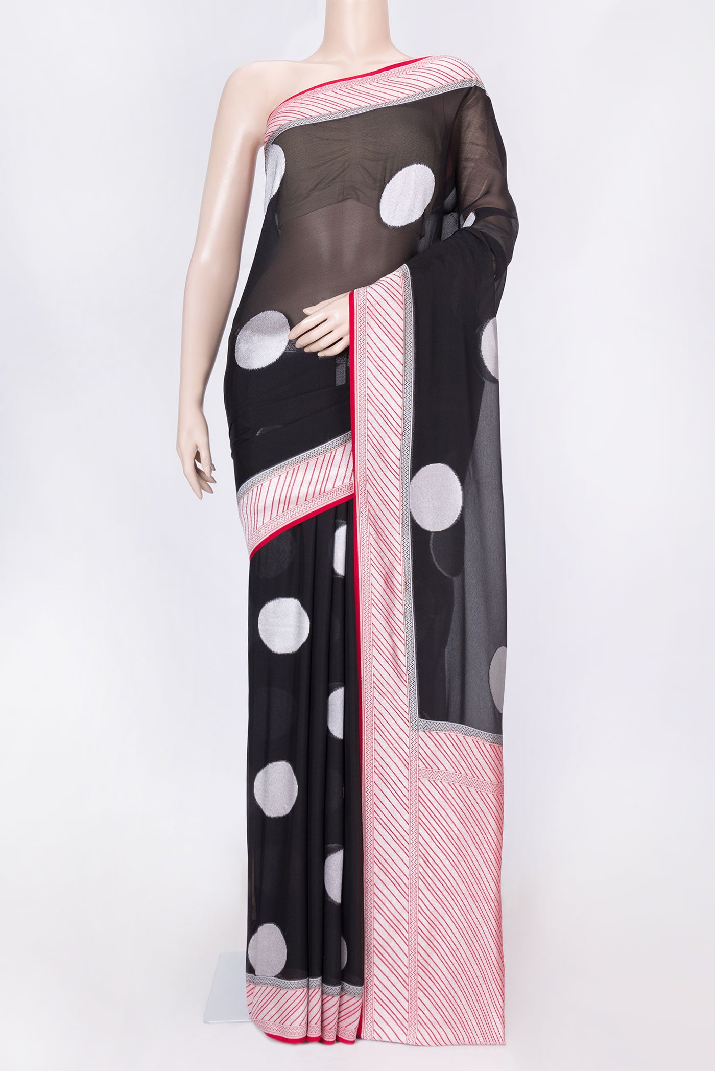 Black Banarasi Georgette Saree with Polka Dots on the body and Zari Border displayed on a mannequin