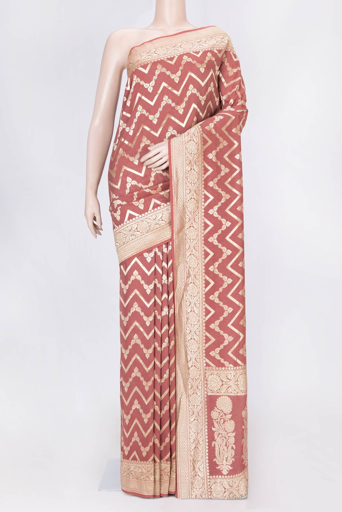 Mauve Dual Tone Tussar Silk Saree with Zari And Thread Butta on the body and Zari Border displayed on a mannequin