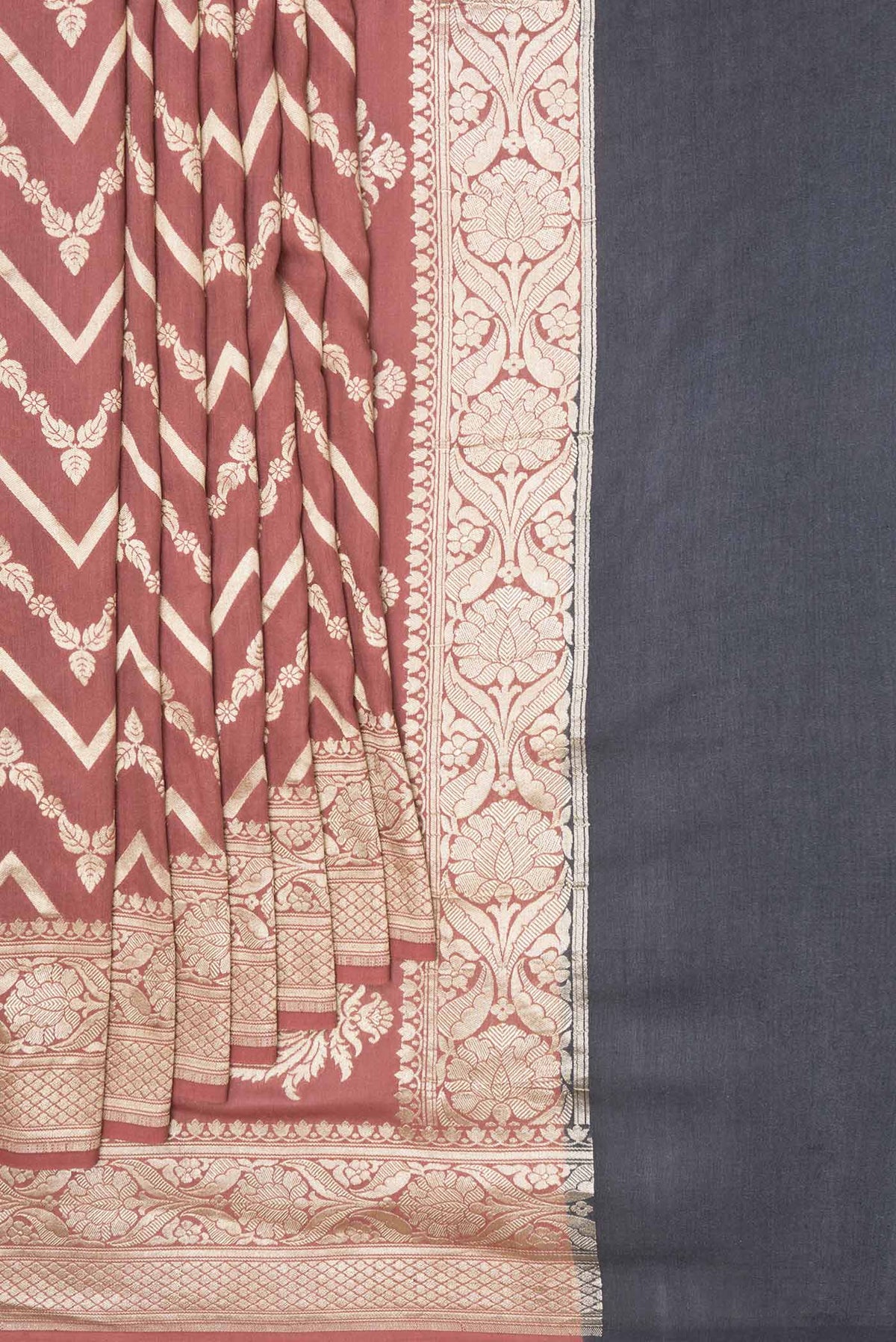 Pleats and pallu of Mauve Dual Tone Tussar Silk Saree with Zari And Thread Butta on the body and Zari Border