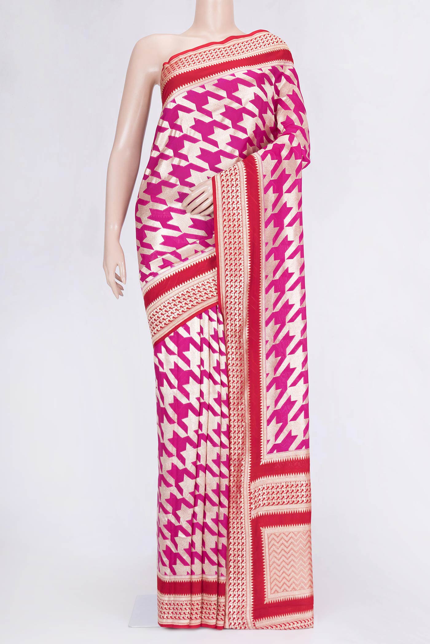 Pink Dual Tone Banarasi Saree with Zari Brocade on the body and Zari Border.  displayed on a mannequin