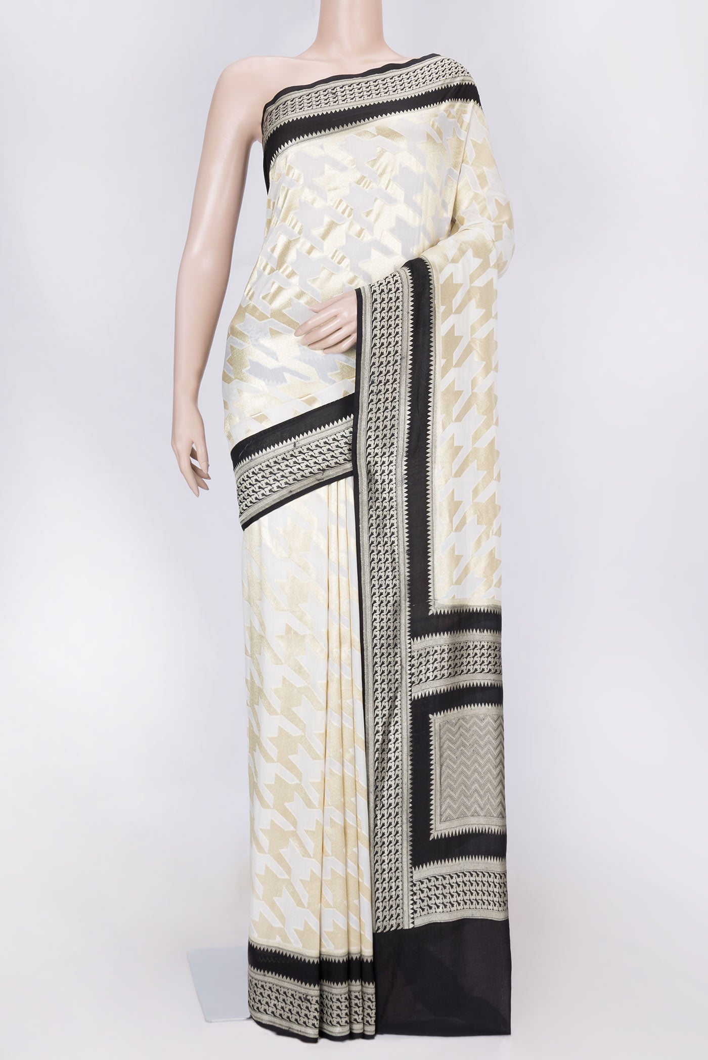 Off White Dual Tone Banarasi Silk Saree with Zari Brocade on the body and Zari Border displayed on a mannequin