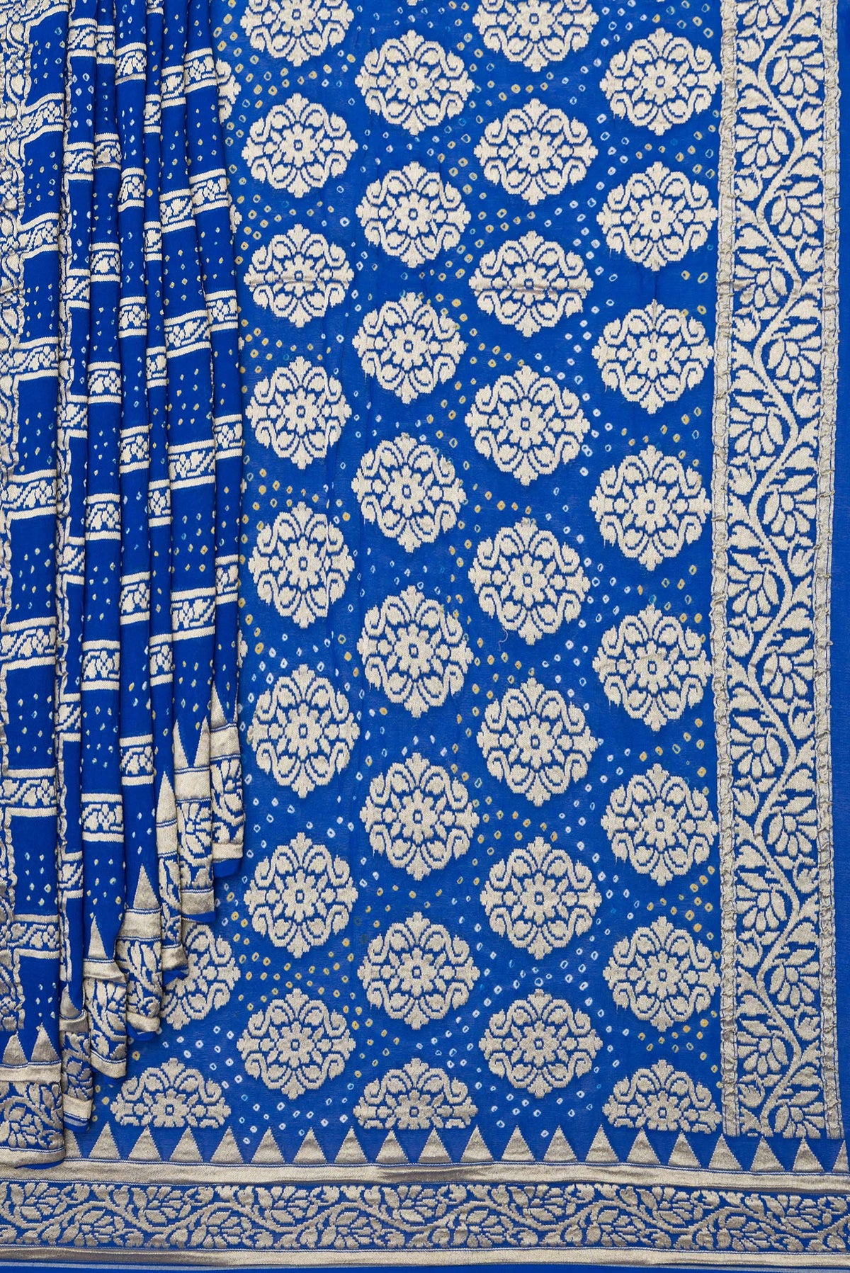 Pleats and pallu of Royal Blue Bandhani Georgette Saree with Zari Brocade on the body and Zari Border. 