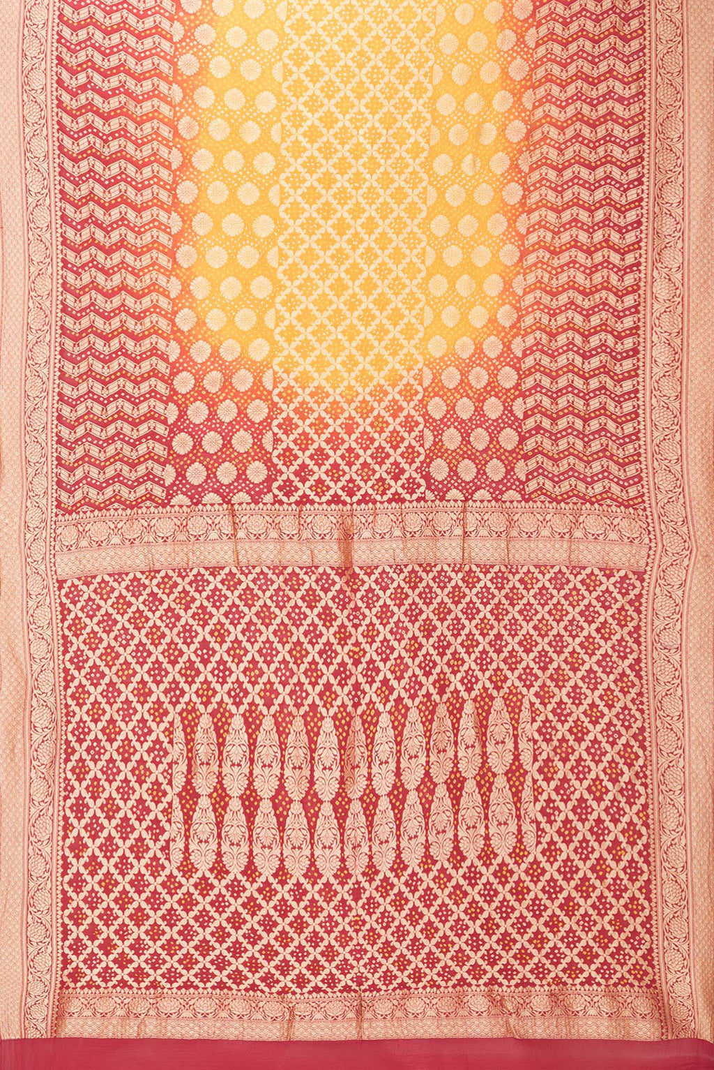 Flat view of Yellow Bandhani Georgette Saree with Zari Brocade on the body and Zari Border. 