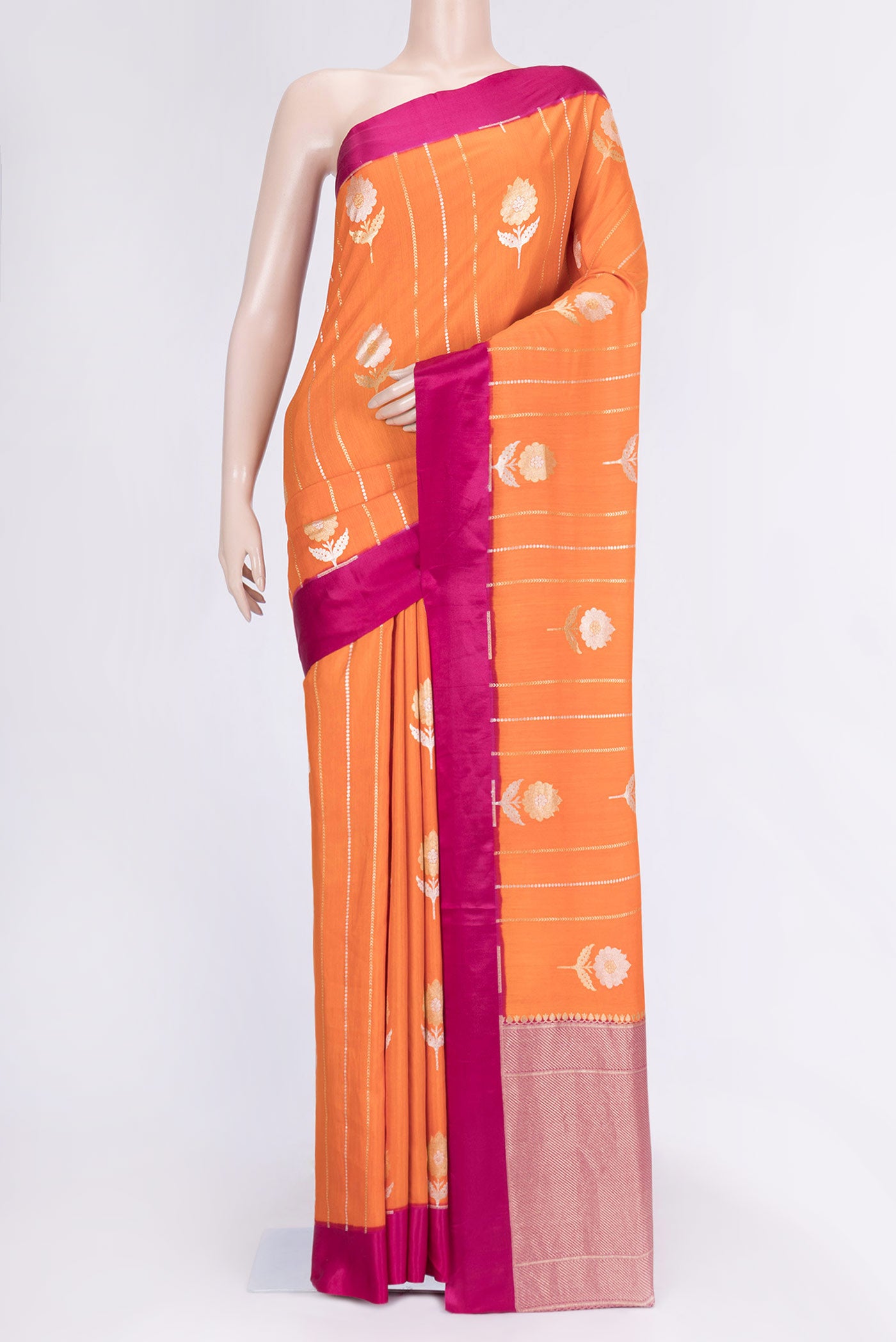 Orange Dual Tone Banarasi Saree with Zari Brocade on the body and Plain Border.  displayed on a mannequin