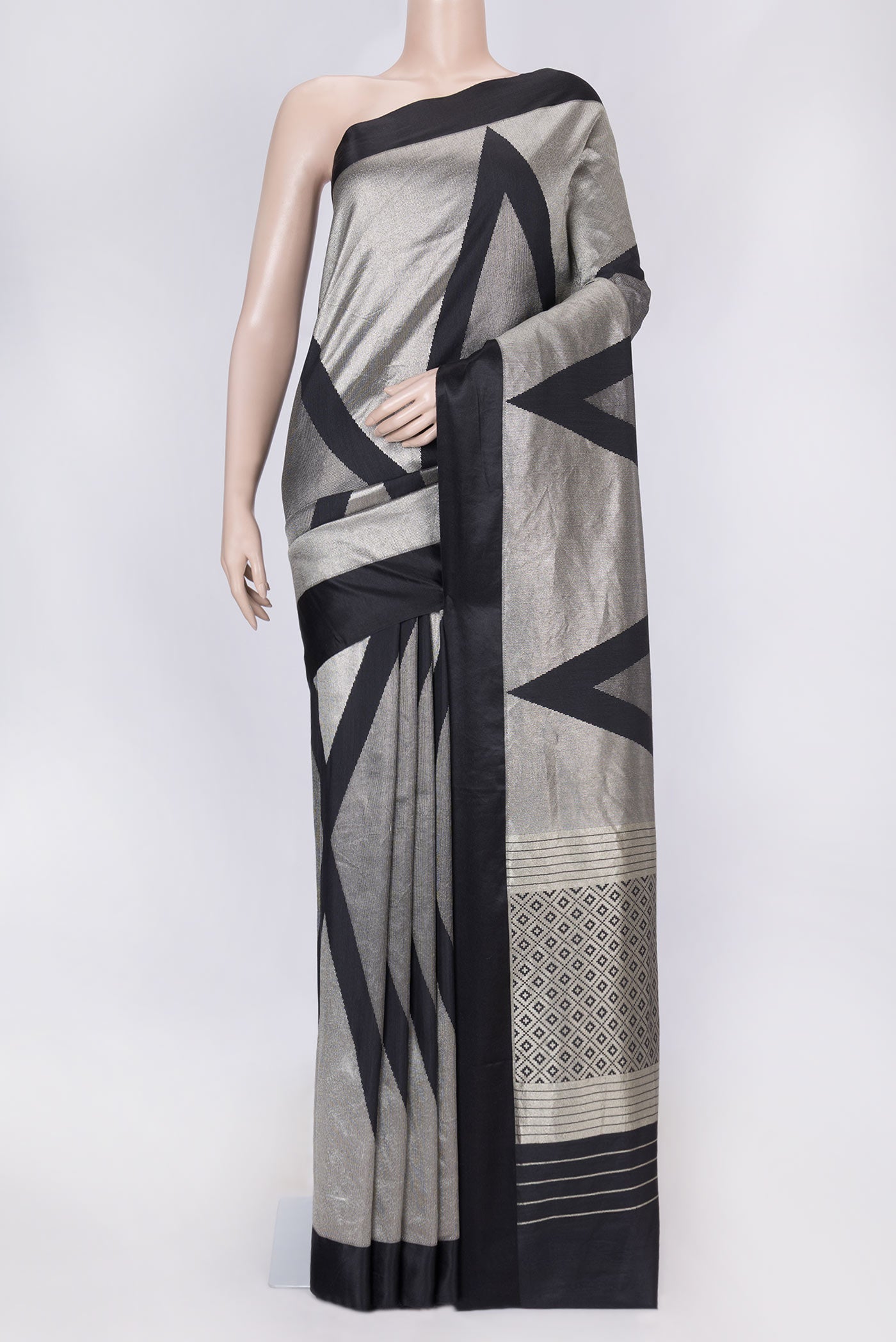 Black Dual Tone Banarasi Silk Saree with Zari Brocade on the body and Plain Border displayed on a mannequin