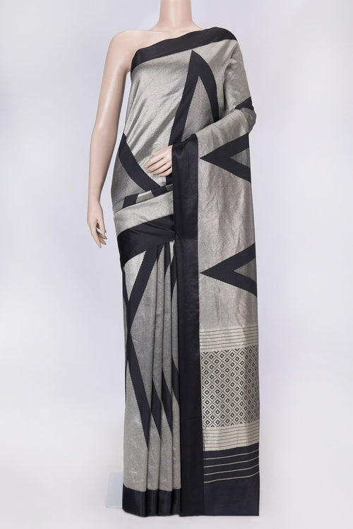 Black Dual Tone Banarasi Silk Saree with Zari Brocade on the body and Plain Border displayed on a mannequin