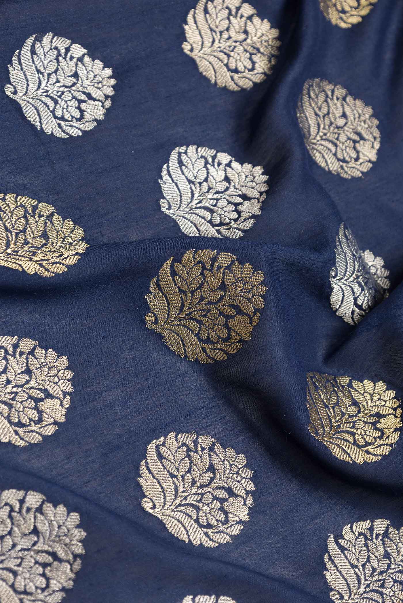 Close up of Navy Blue Dual Tone Banarasi Saree with Zari Brocade on the body and Zari Border.  displaying folds