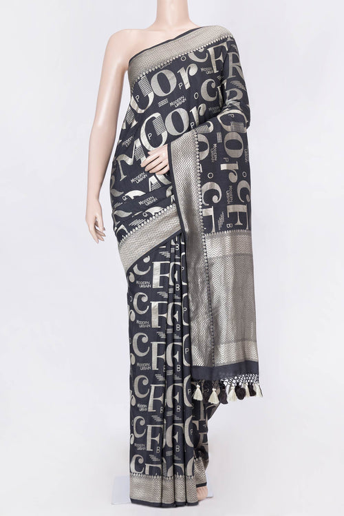 Black Dual Tone Banarasi Silk Saree with Zari Brocade on the body and Zari Border displayed on a mannequin