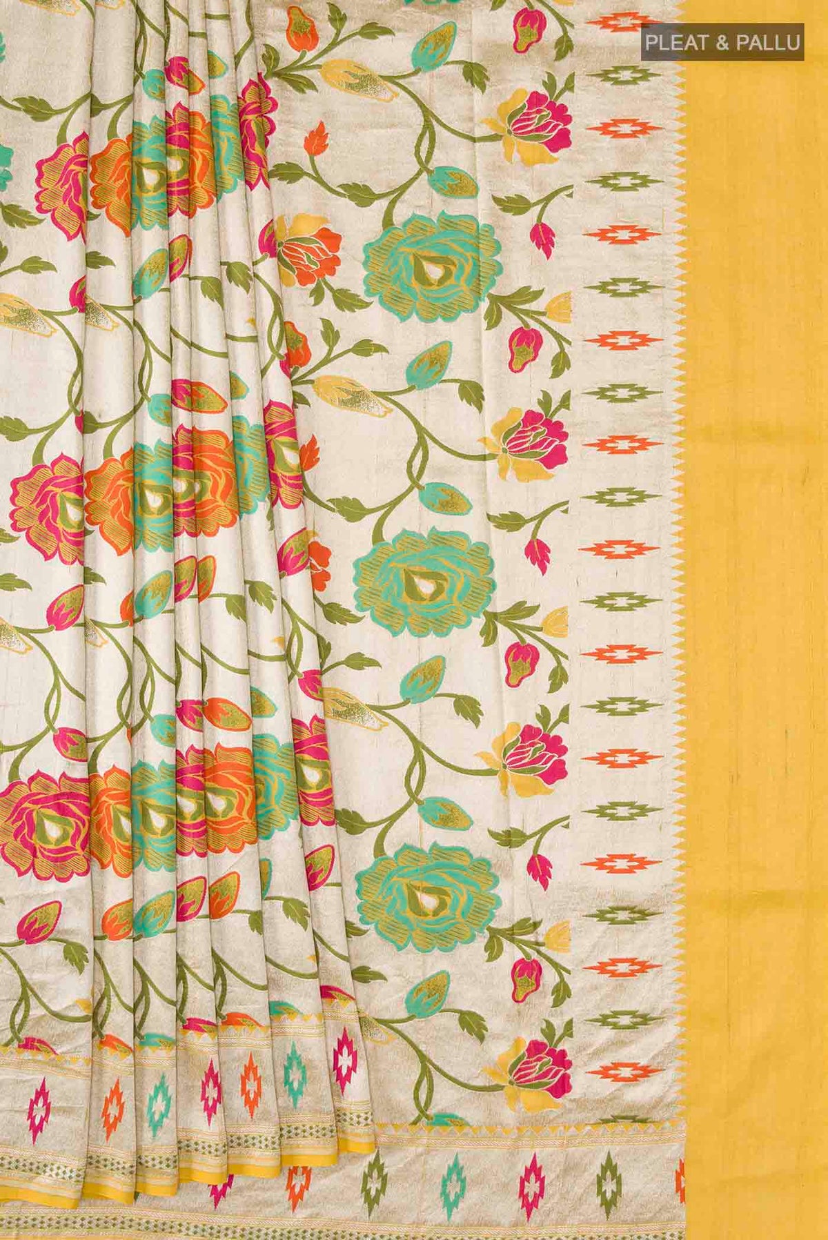 Pleats and pallu of Yellow Banarasi Georgette Saree with Zari And Thread Butta on the body and Zari Border