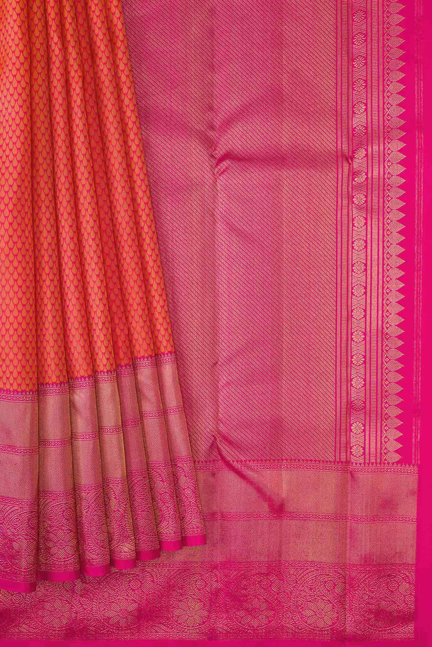 Pleats and pallu of Pure Silk Pure Zari Peach Dual Tone Kanjivaram Saree with Jacquard design on the body and Zari Border. 