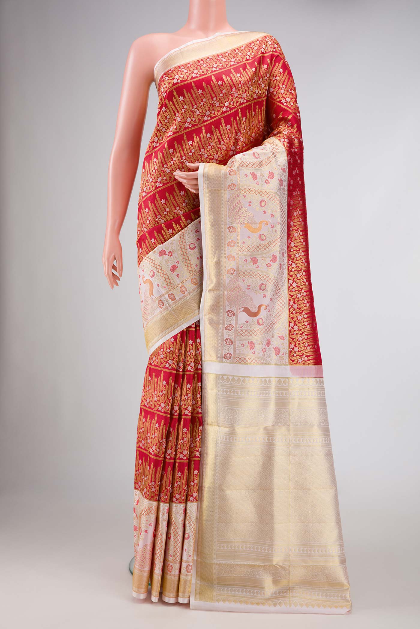 Red Dual Tone Kanjivaram Silk Saree with Zari Brocade on the body and Fancy Border.  displayed on a mannequin