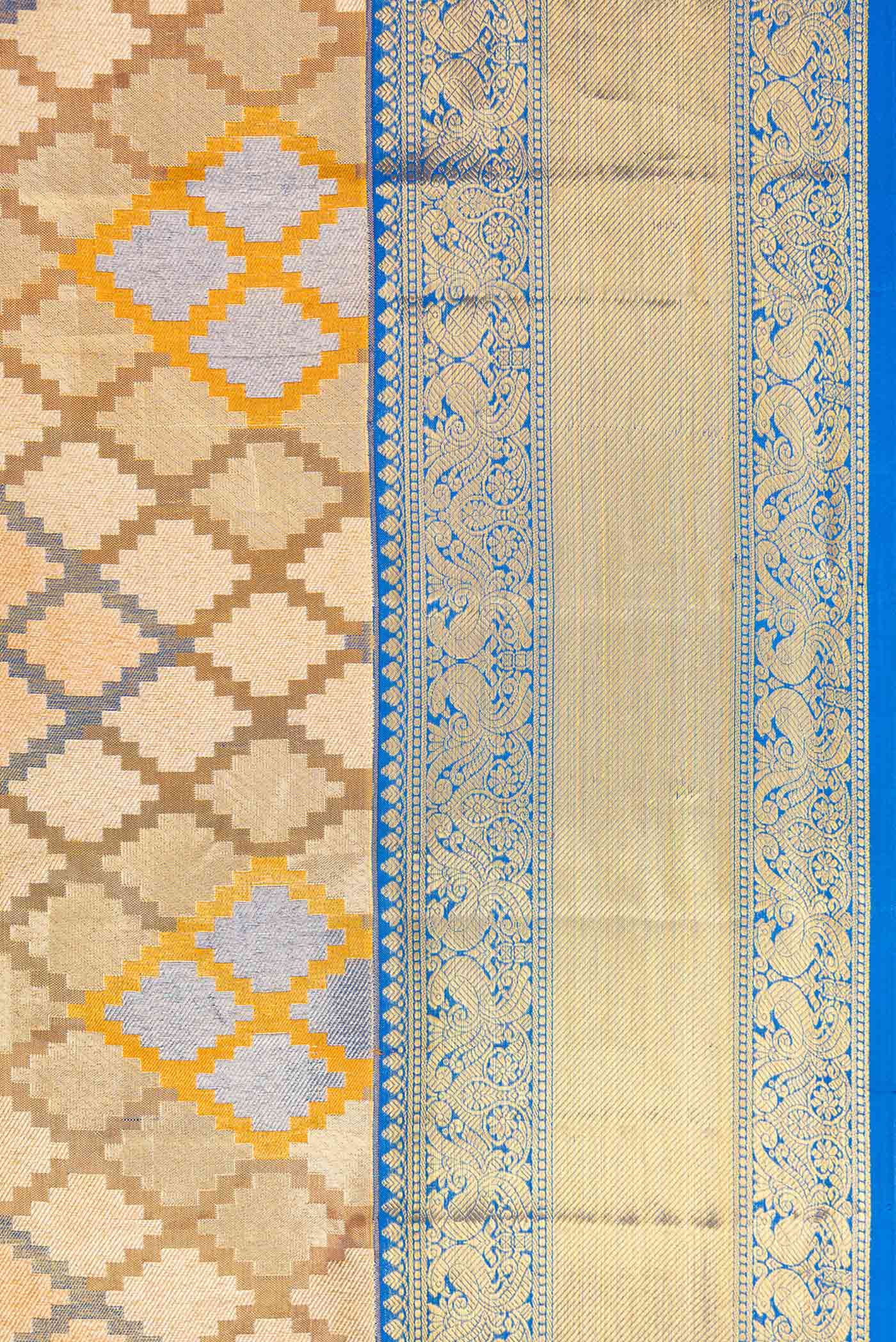 Border image of Gold Dual Tone Kanjivaram Tissue Silk Saree with Zari Brocade on the body and Zari Border. 