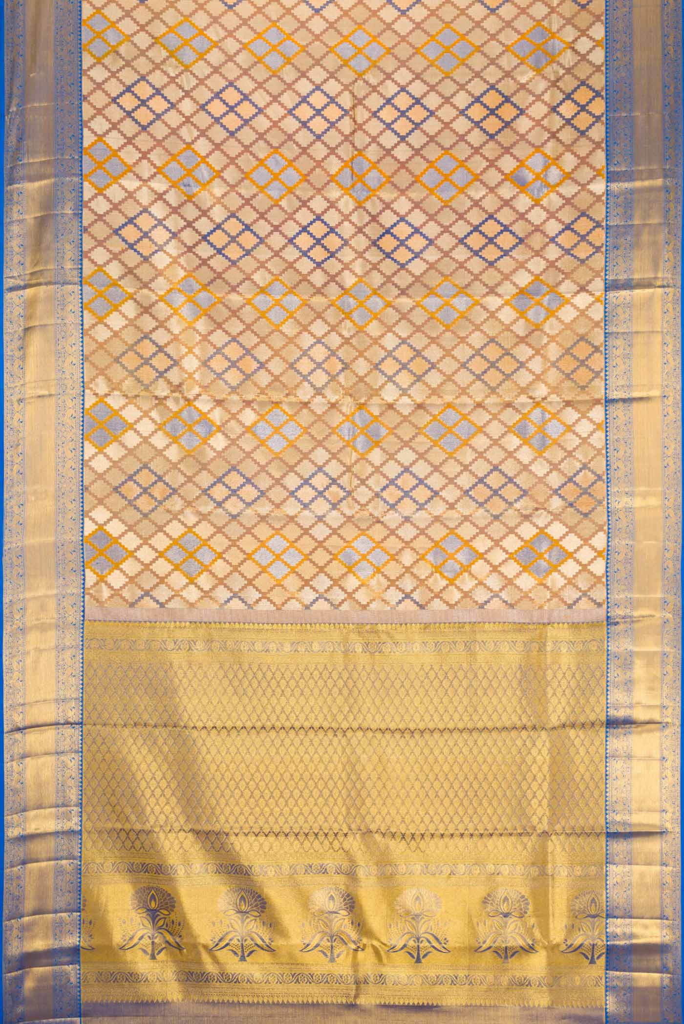 Flat view of Gold Dual Tone Kanjivaram Tissue Silk Saree with Zari Brocade on the body and Zari Border. 