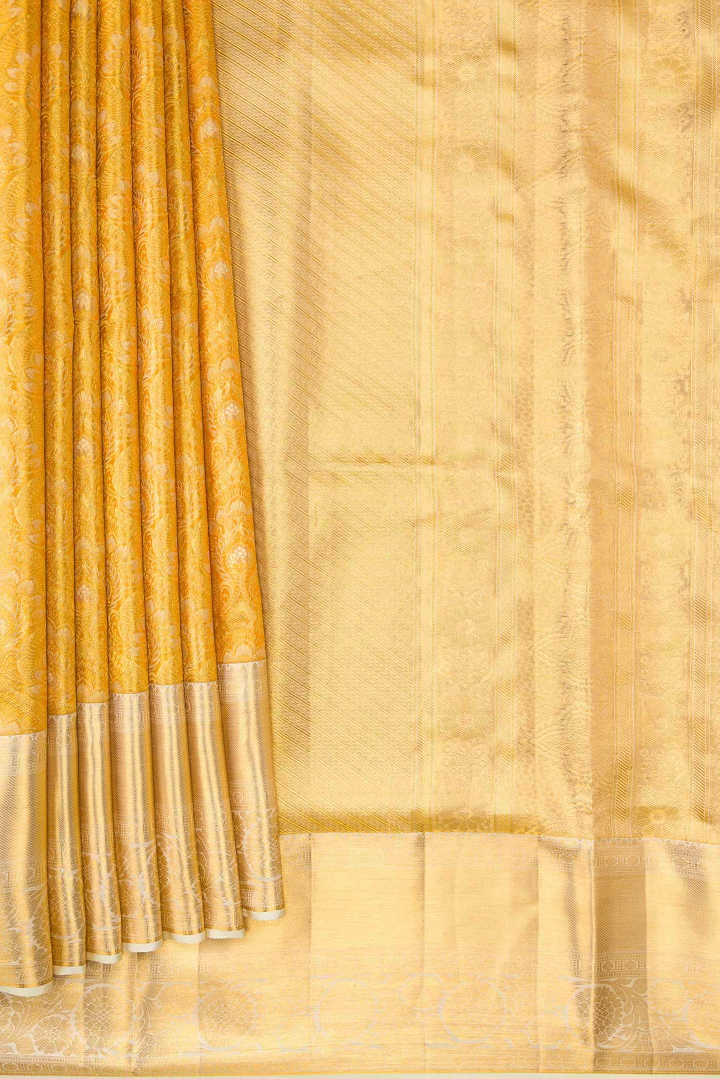 Pleats and pallu of Gold Dual Tone Kanjivaram Tissue Silk Saree with Zari Brocade on the body and Zari Border. 