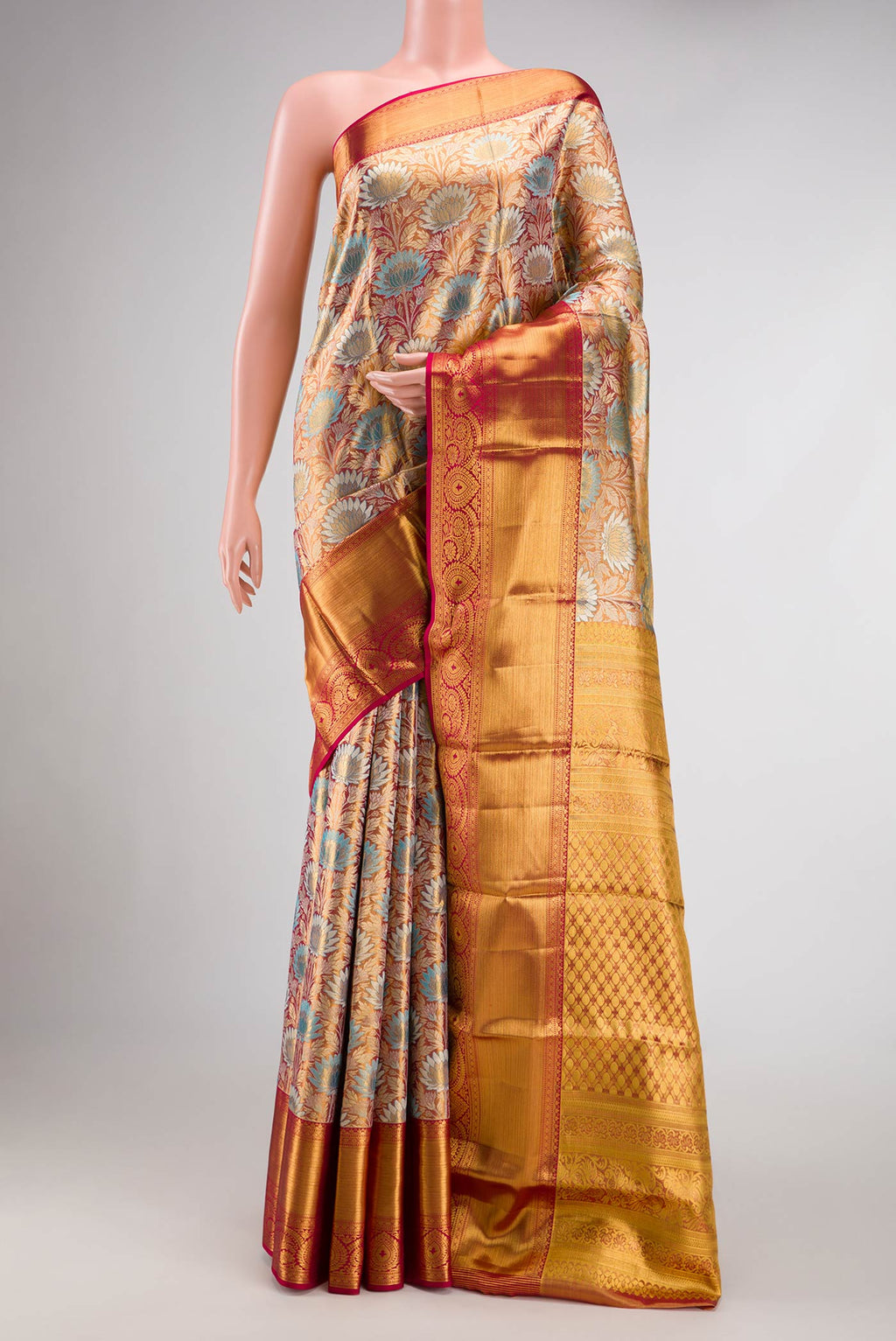 Maroon Dual Tone Kanjivaram Tissue Silk Saree with Zari Brocade on the body and Zari Border.  displayed on a mannequin