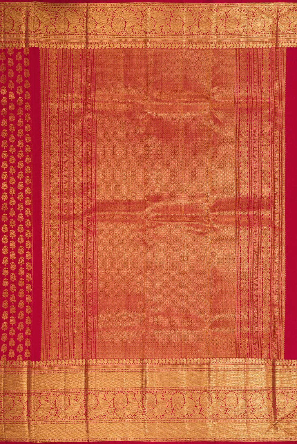Close up image of the pallu of Red Dual Tone Kanchipuram Silk Saree with Zari Brocade on the body and Zari Border. 