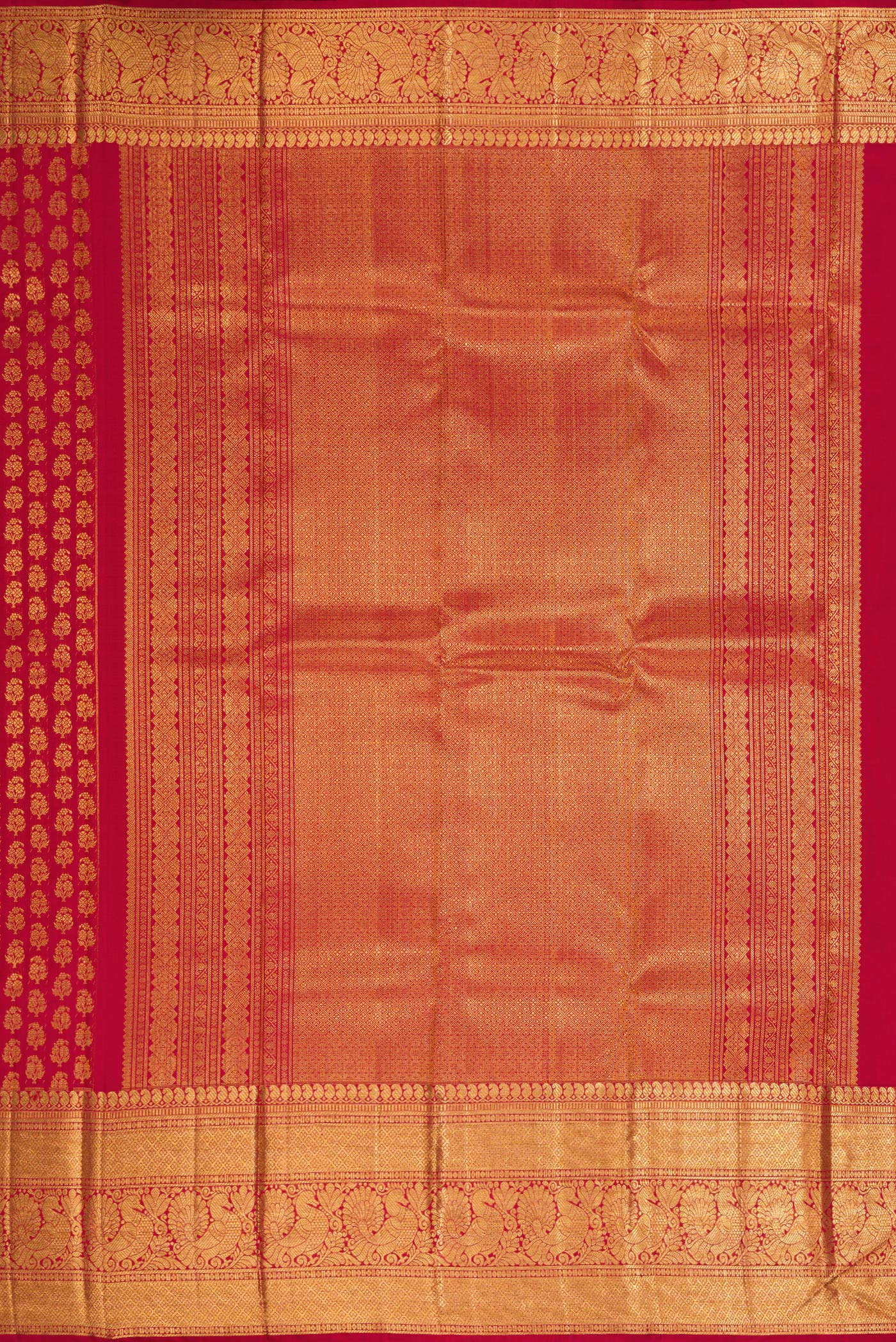 Close up image of the pallu of Red Dual Tone Kanchipuram Silk Saree with Zari Brocade on the body and Zari Border. 