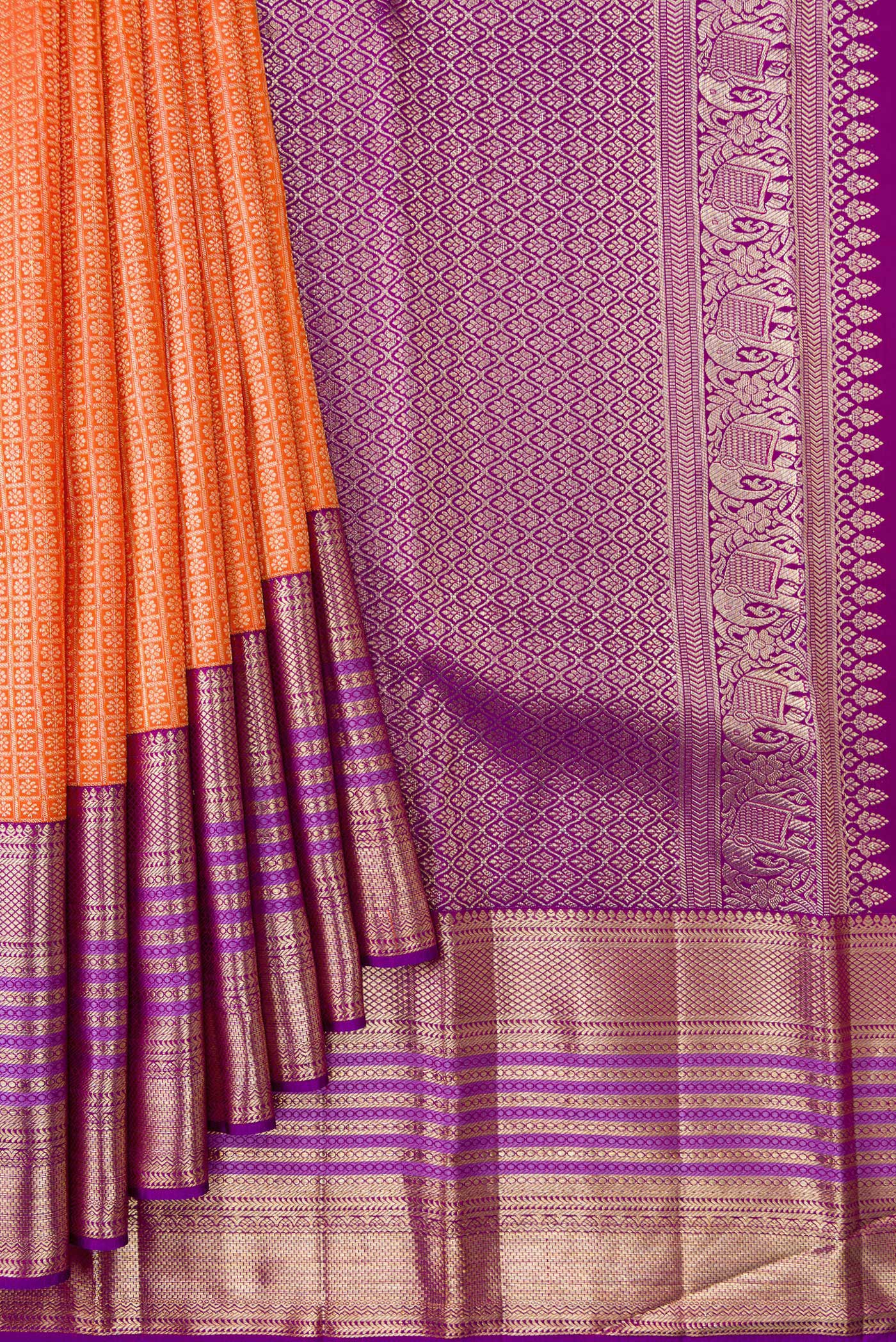 Pleats and pallu of Brick Orange Dual Tone Kanchipuram Silk Saree with Zari Brocade on the body and Zari Border. 