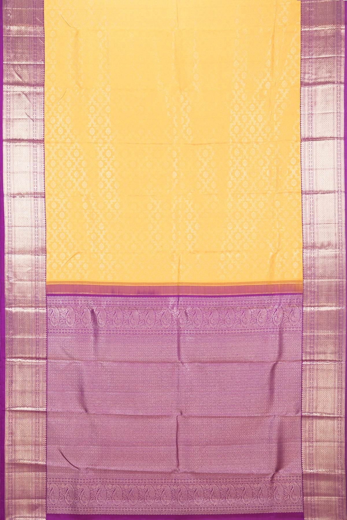 Flat view of Pure Silk Yellow Kanchipuram Saree with Zari Brocade on the body and Zari Border. 