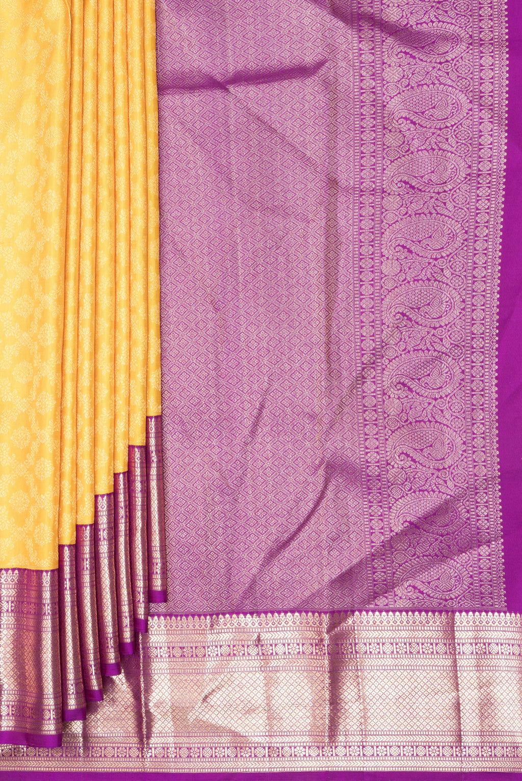 Pleats and pallu of Pure Silk Yellow Kanchipuram Saree with Zari Brocade on the body and Zari Border. 