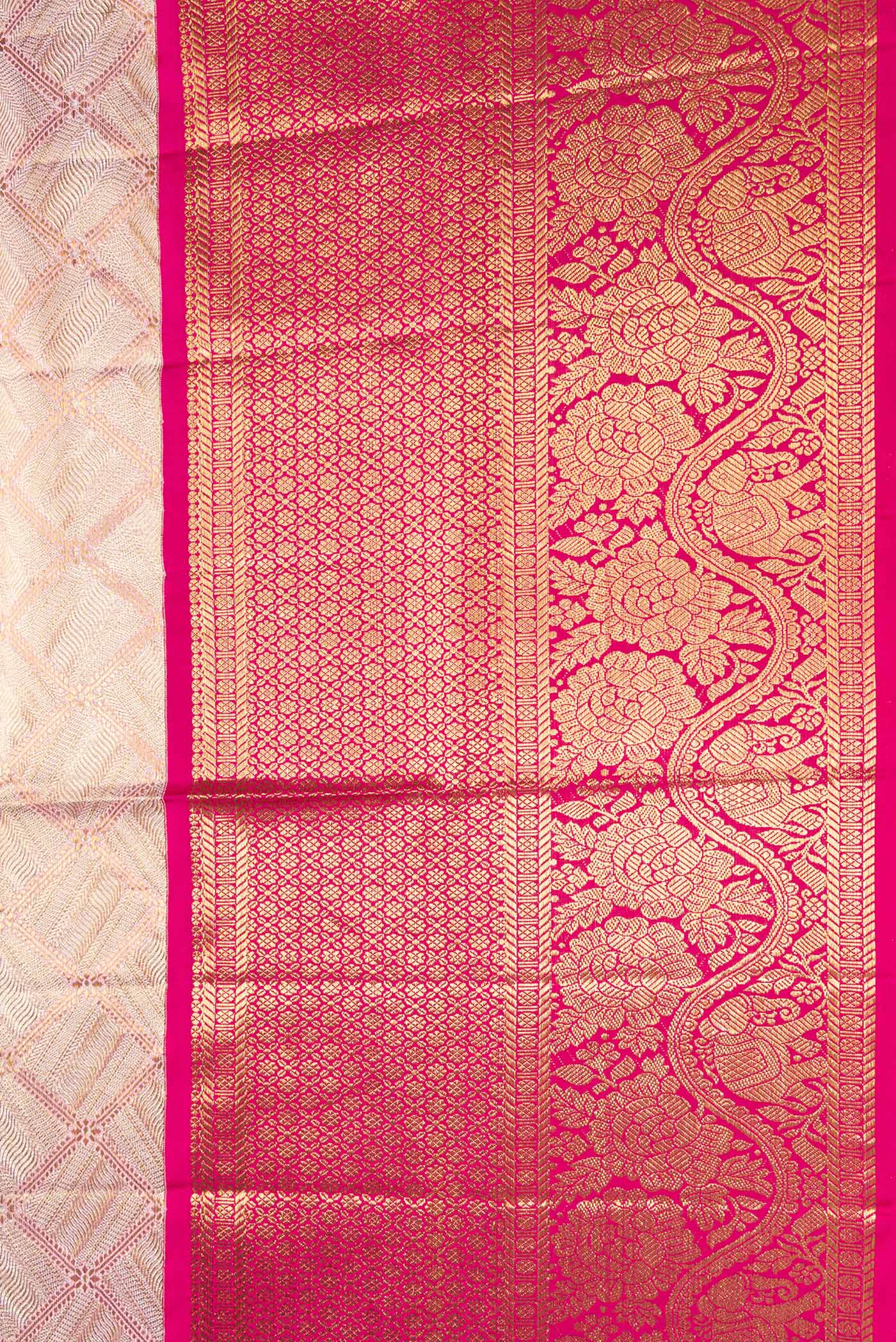 Border image of Rose Gold Dual Tone Kanjivaram Tissue Silk Saree with Zari Brocade on the body and Zari Border. 