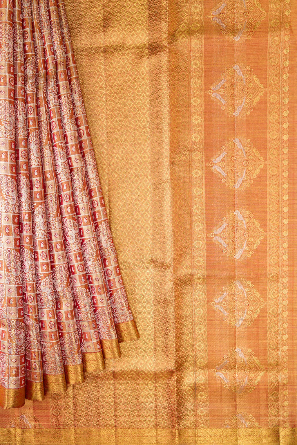 Pleats and pallu of Gold Dual Tone Kanjivaram Tissue Silk Saree with Zari Brocade on the body and Zari Border. 