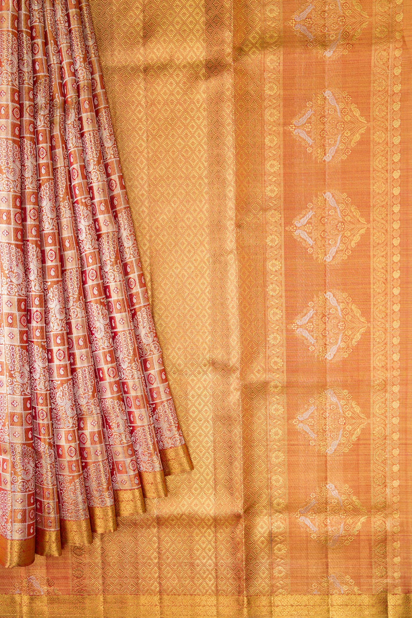 Pleats and pallu of Gold Dual Tone Kanjivaram Tissue Silk Saree with Zari Brocade on the body and Zari Border. 