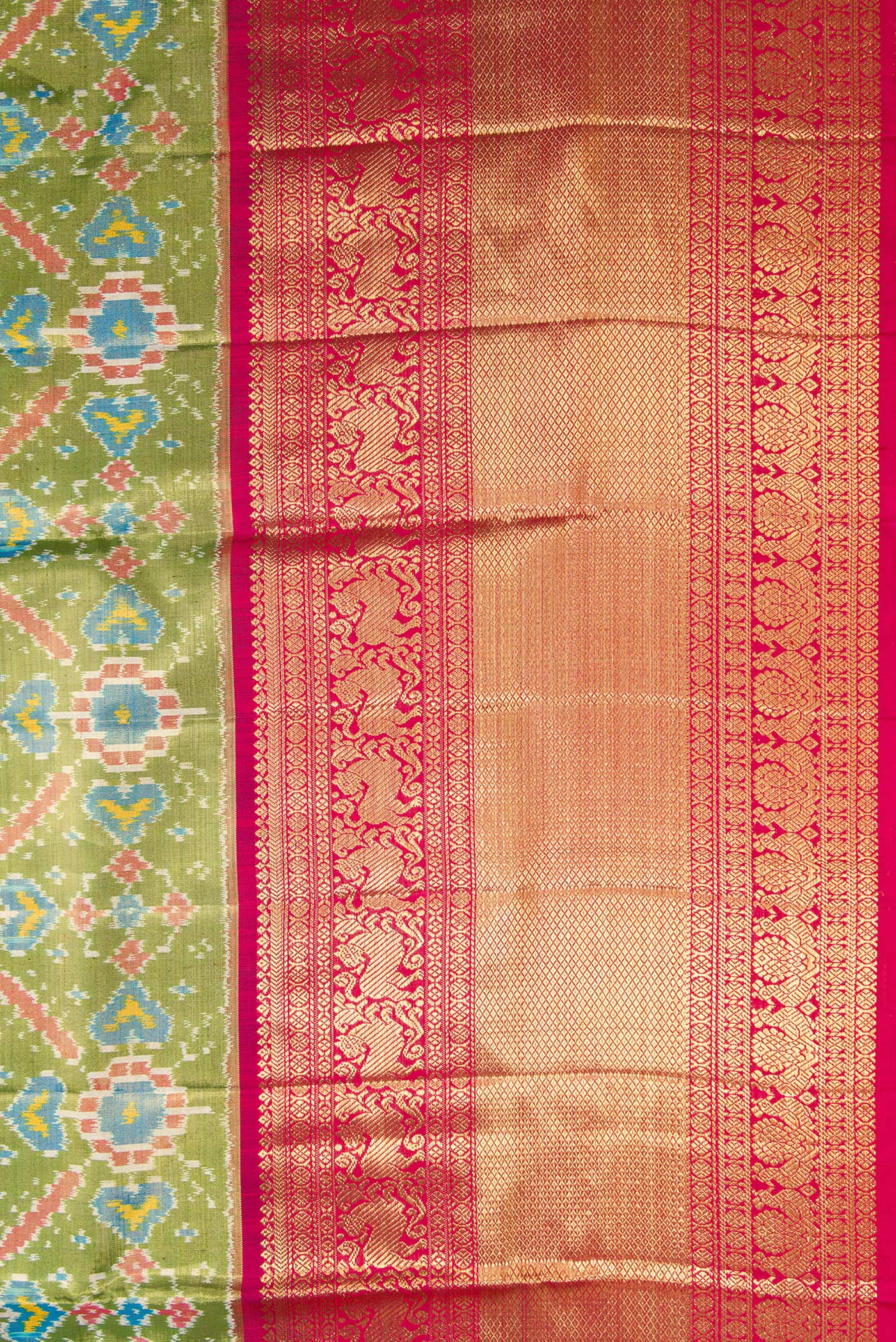 Border image of Pure Silk Pure Zari Mehandi Green Dual Tone Kanjivaram Tissue Saree with Ikat Print on the body and Zari Border. 