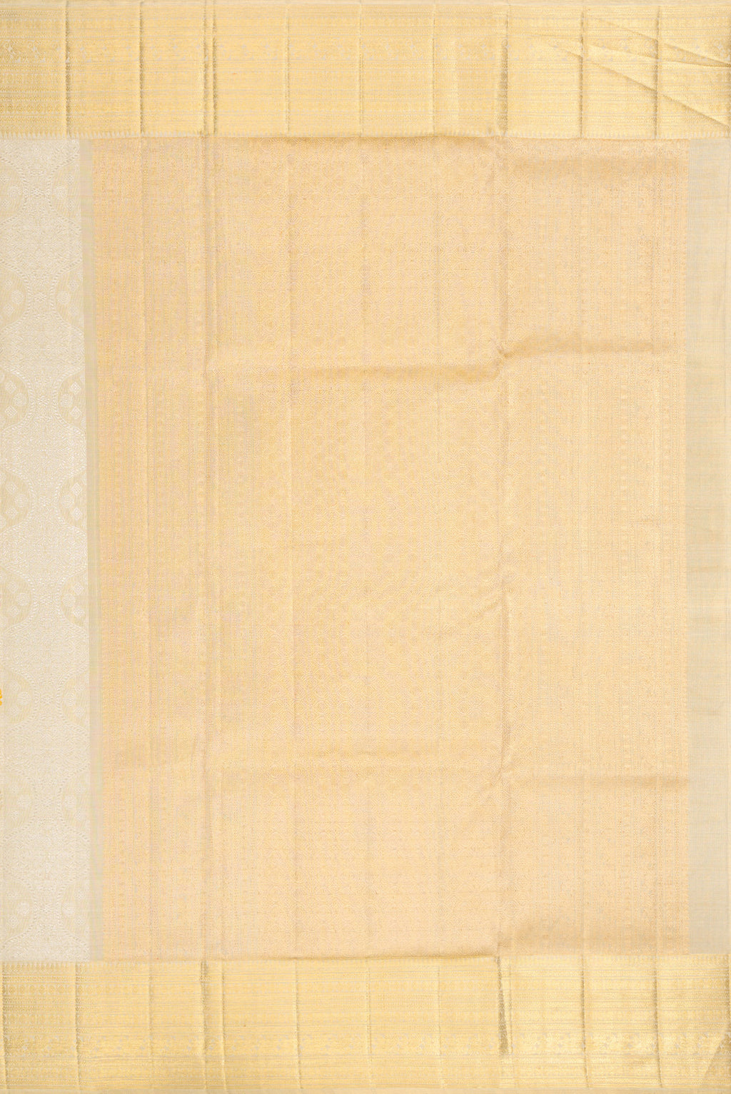 Close up image of the pallu of Beige Dual Tone Kanjivaram Tissue Silk Saree with Zari Brocade on the body and Zari Border. 