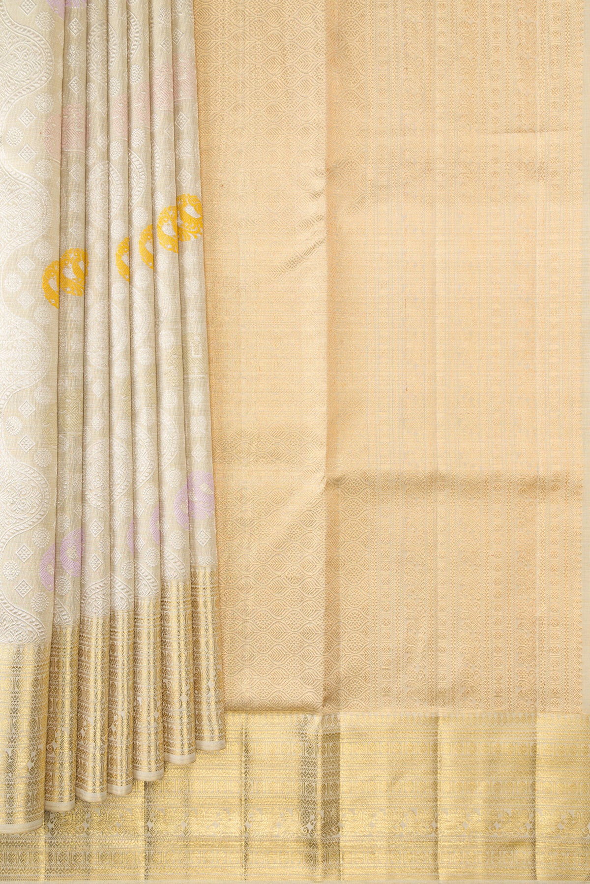 Pleats and pallu of Beige Dual Tone Kanjivaram Tissue Silk Saree with Zari Brocade on the body and Zari Border. 