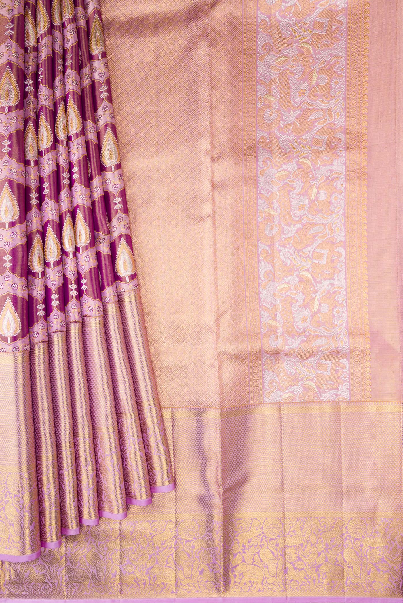 Pleats and pallu of Purple Dual Tone Kanjivaram Tissue Silk Saree with Zari Brocade on the body and Zari Border. 