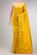 Yellow Dual Tone Kanchipuram Silk Saree with Zari Brocade on the body and Zari Border.  displayed on a mannequin