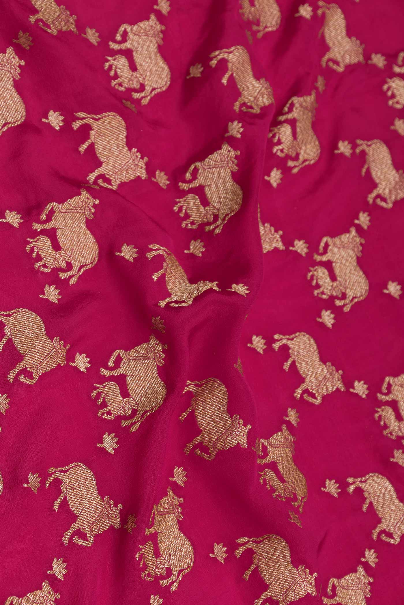 Close up of Pink Dual Tone Banarasi Georgette Saree with Zari Brocade on the body and Zari Border displaying folds