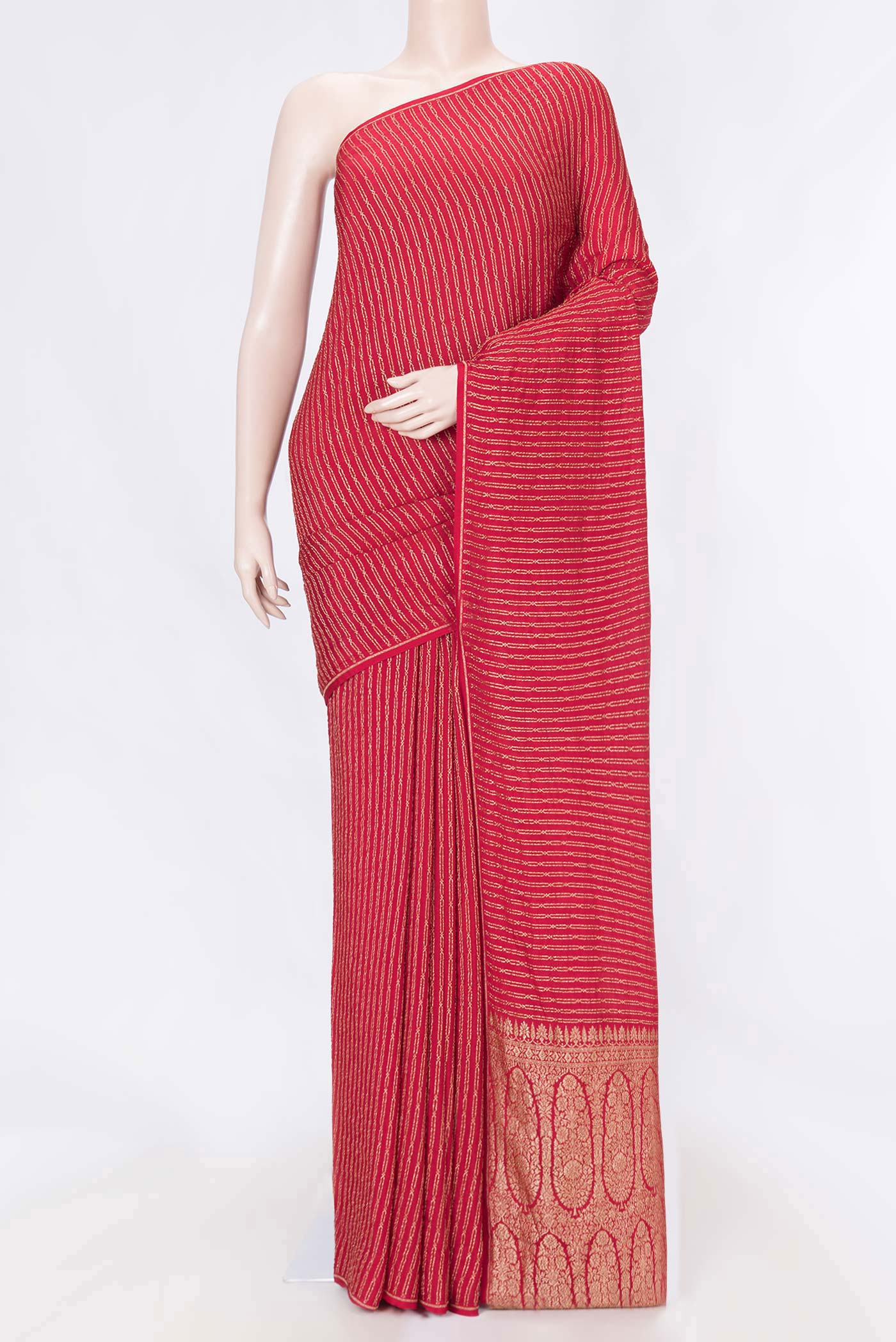 Red Dual Tone Georgette Saree with Zari Butta on the body and Thin Zari Line displayed on a mannequin
