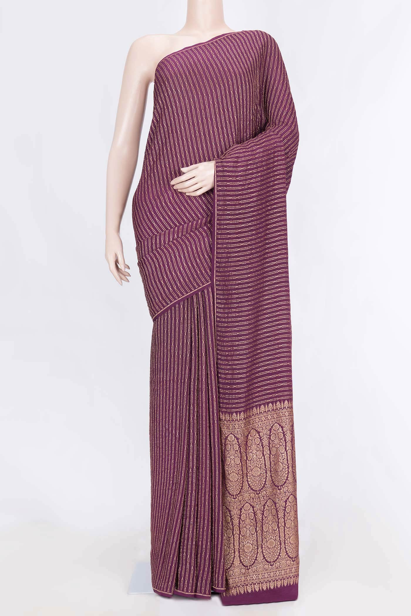Purple Mysore Crepe Saree with Stripes on the body and Thin Zari Line displayed on a mannequin