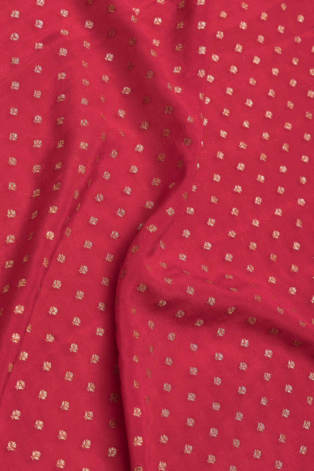 Close up of Red Dual Tone Banarasi Georgette Saree with Zari Butta on the body and Zari Border.  displaying folds
