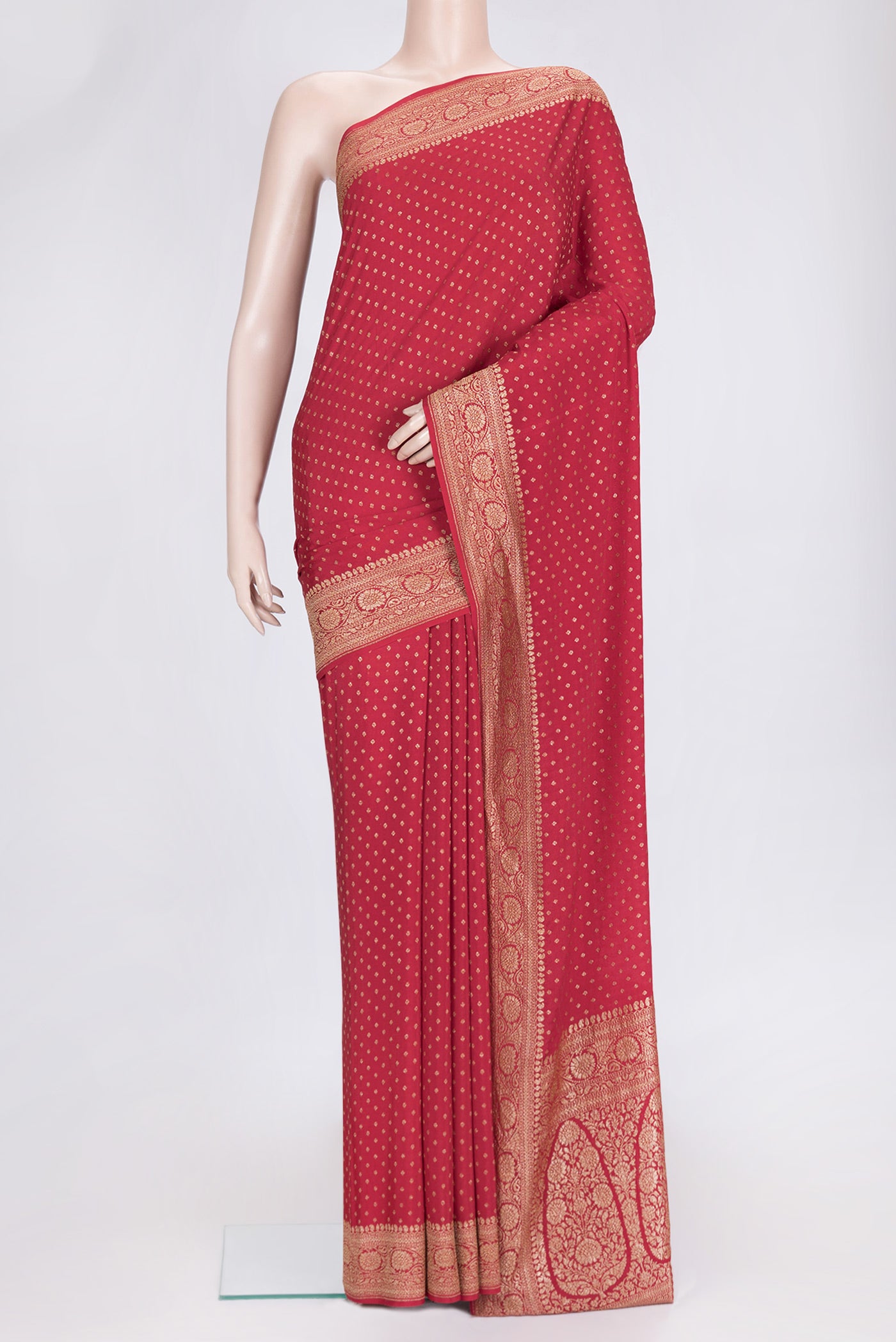 Red Dual Tone Banarasi Georgette Saree with Zari Butta on the body and Zari Border.  displayed on a mannequin