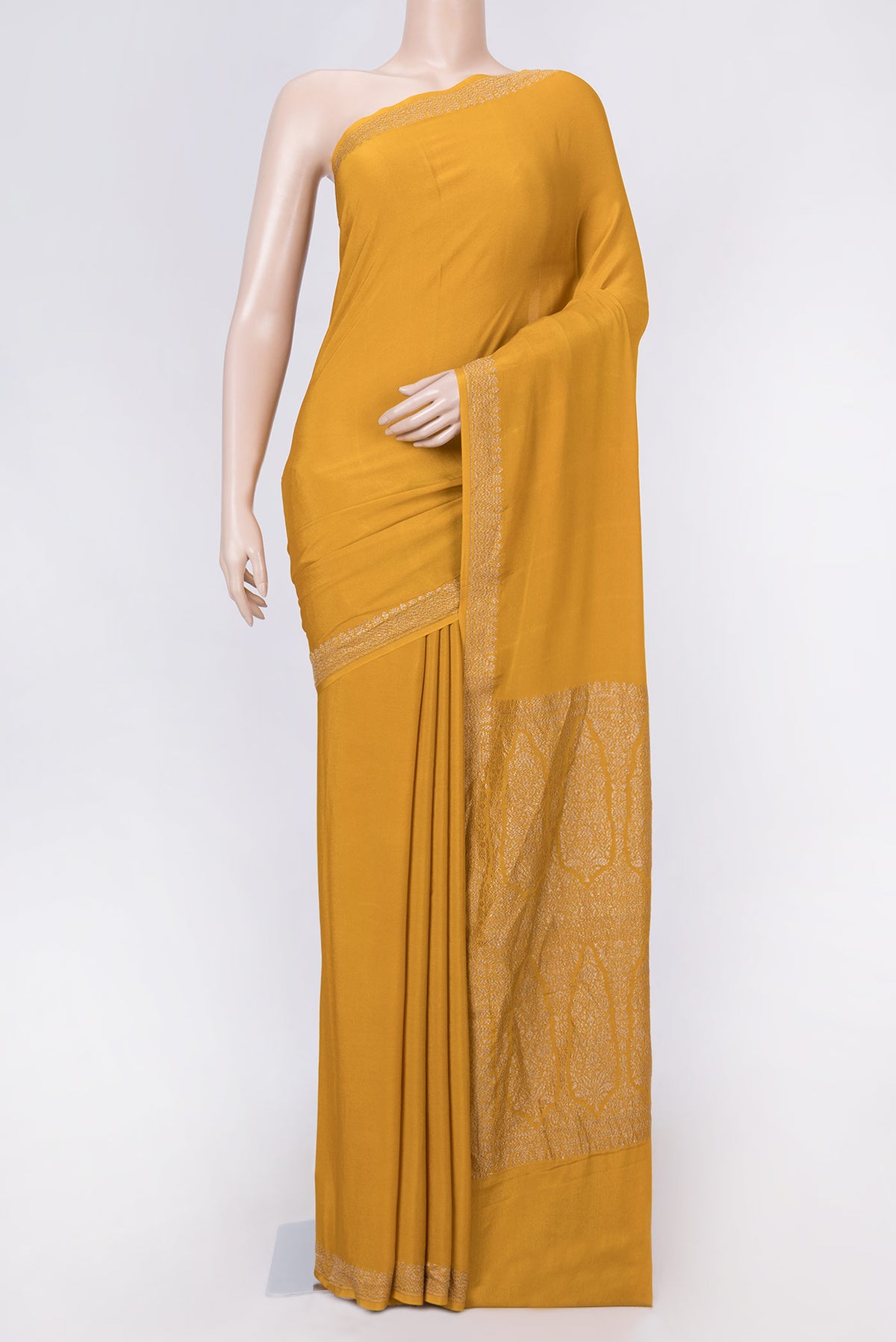 Mustard Dual Tone Banarasi Georgette Saree with Plain Body and Zari Border displayed on a mannequin