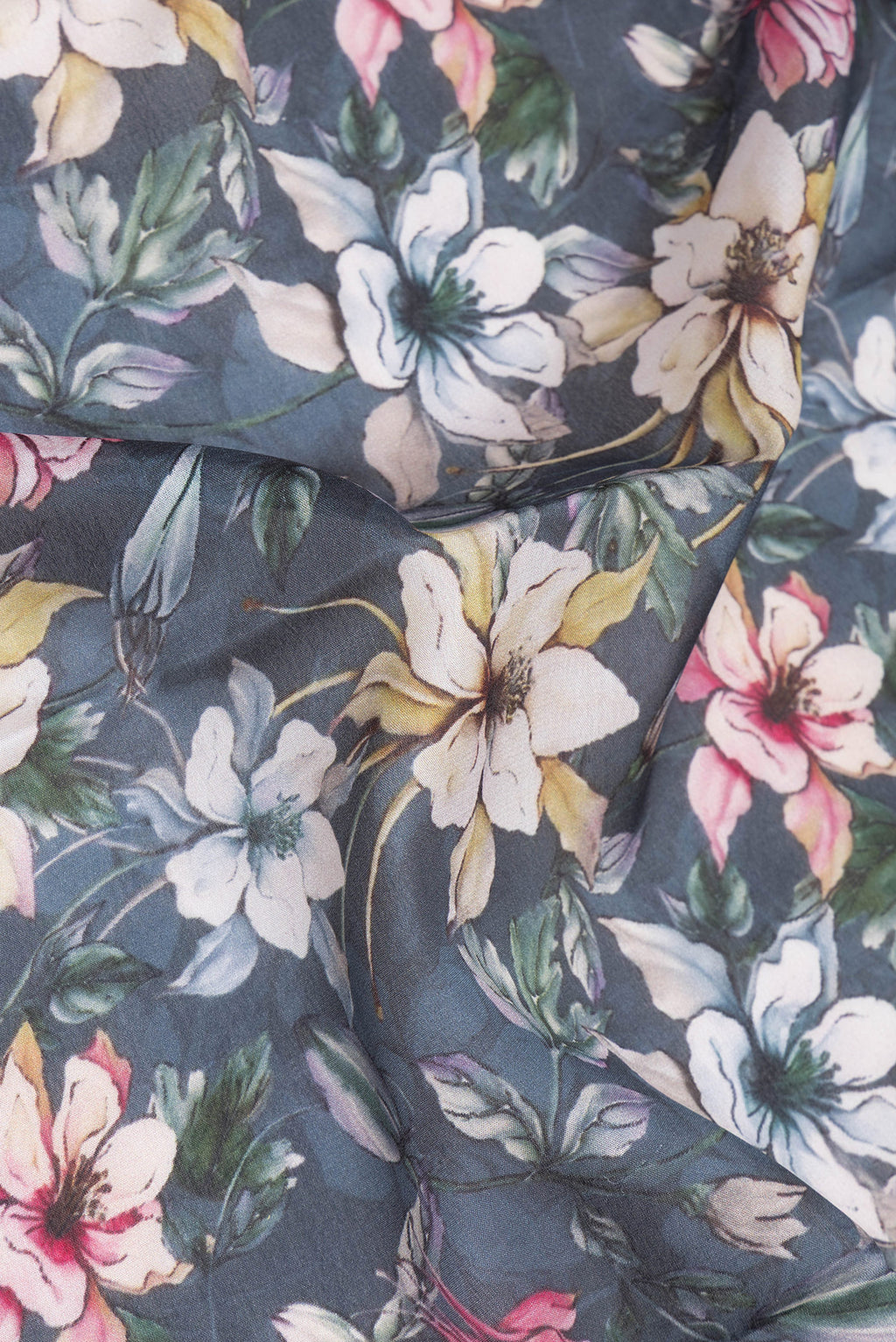 Close up of Grey Mysore Silk Saree with Printed design on the body and Zari Border.  displaying folds