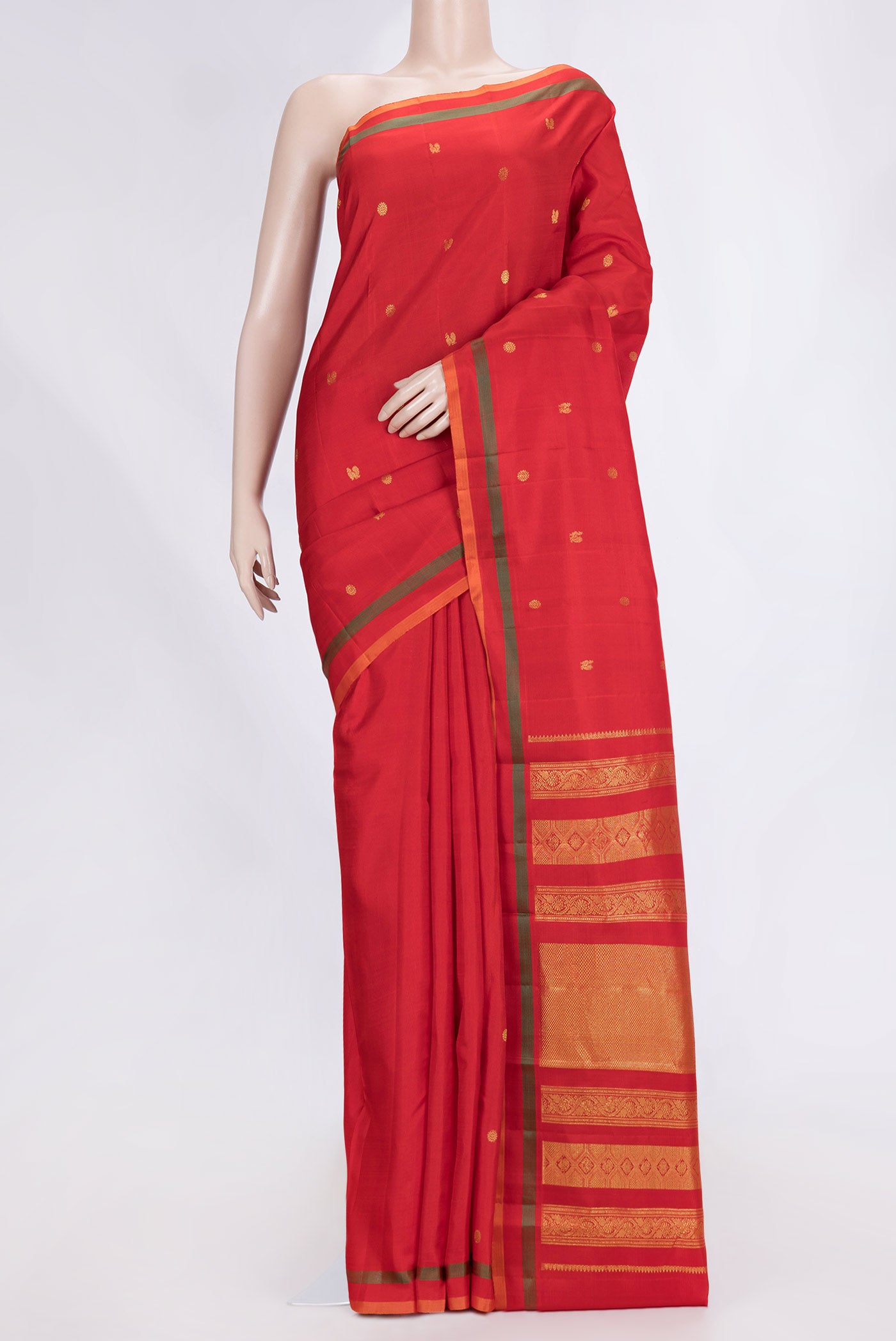 Red Dual Tone Kanchipuram Saree with Zari Butta on the body and Plain Border.  displayed on a mannequin