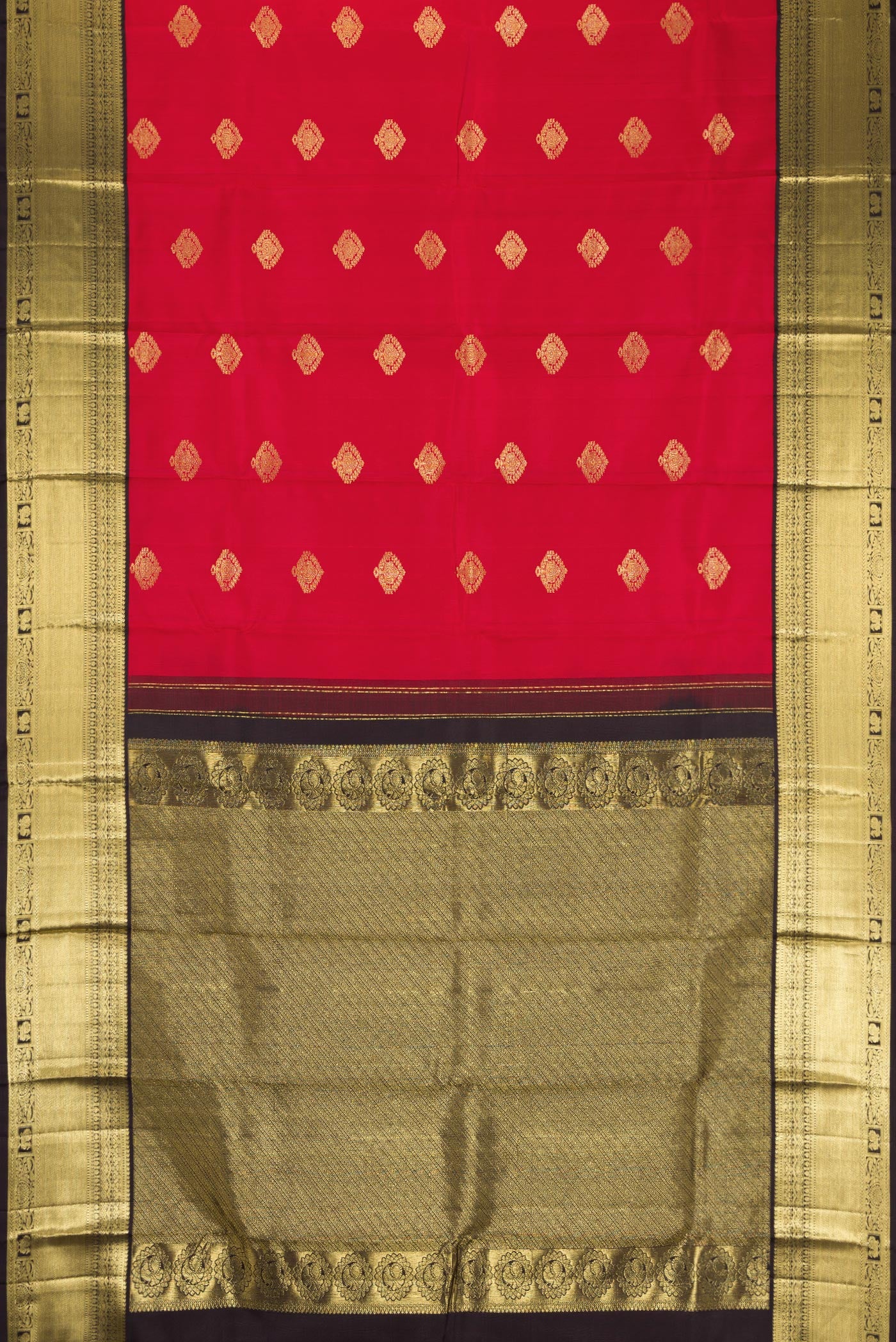 Flat view of Maroon Dual Tone Kanjivaram Silk Saree with Zari Butta on the body and Fancy Border. 