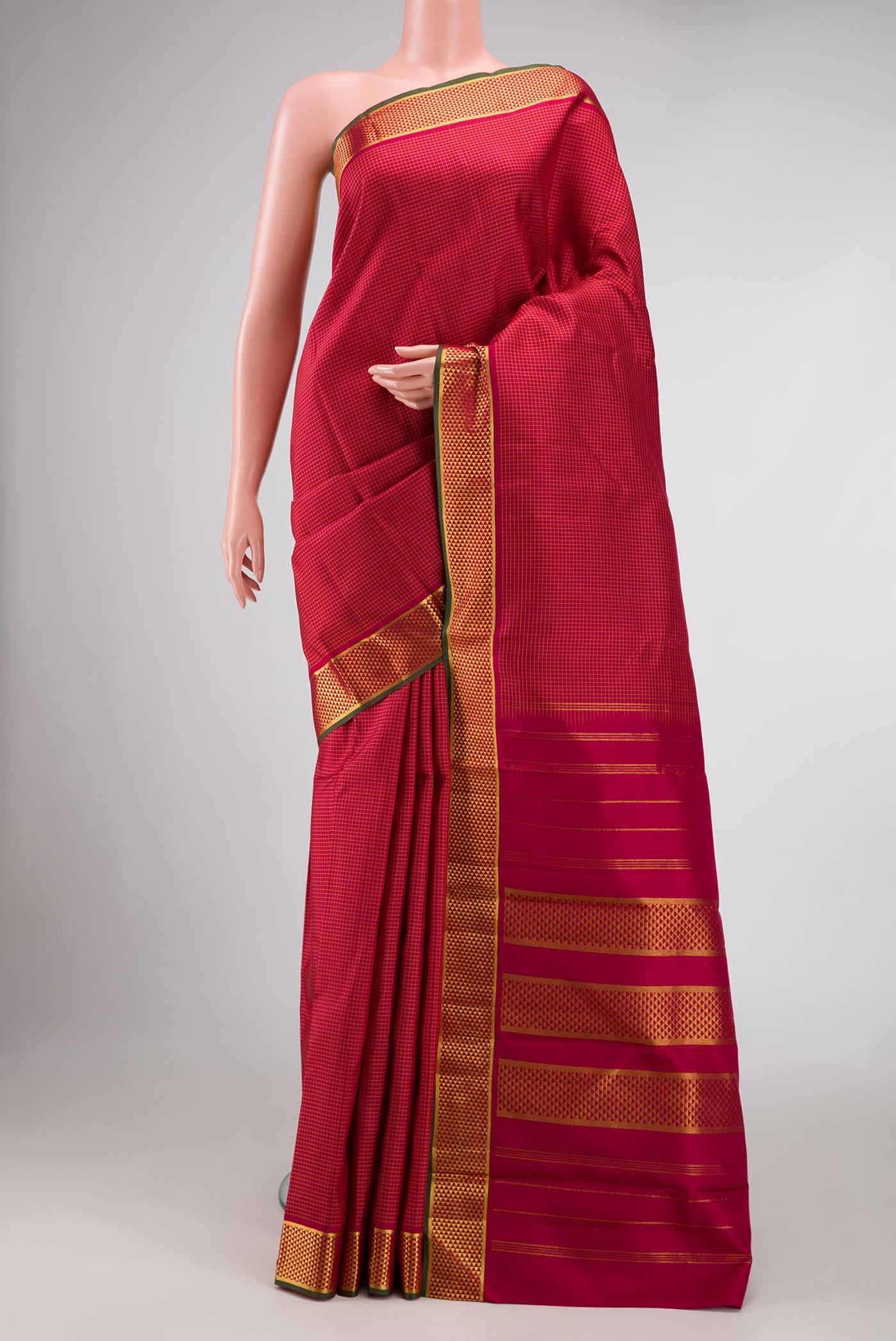 Maroon Dual Tone Kanchipuram Silk Saree with Checked design on the body and Zari Border displayed on a mannequin